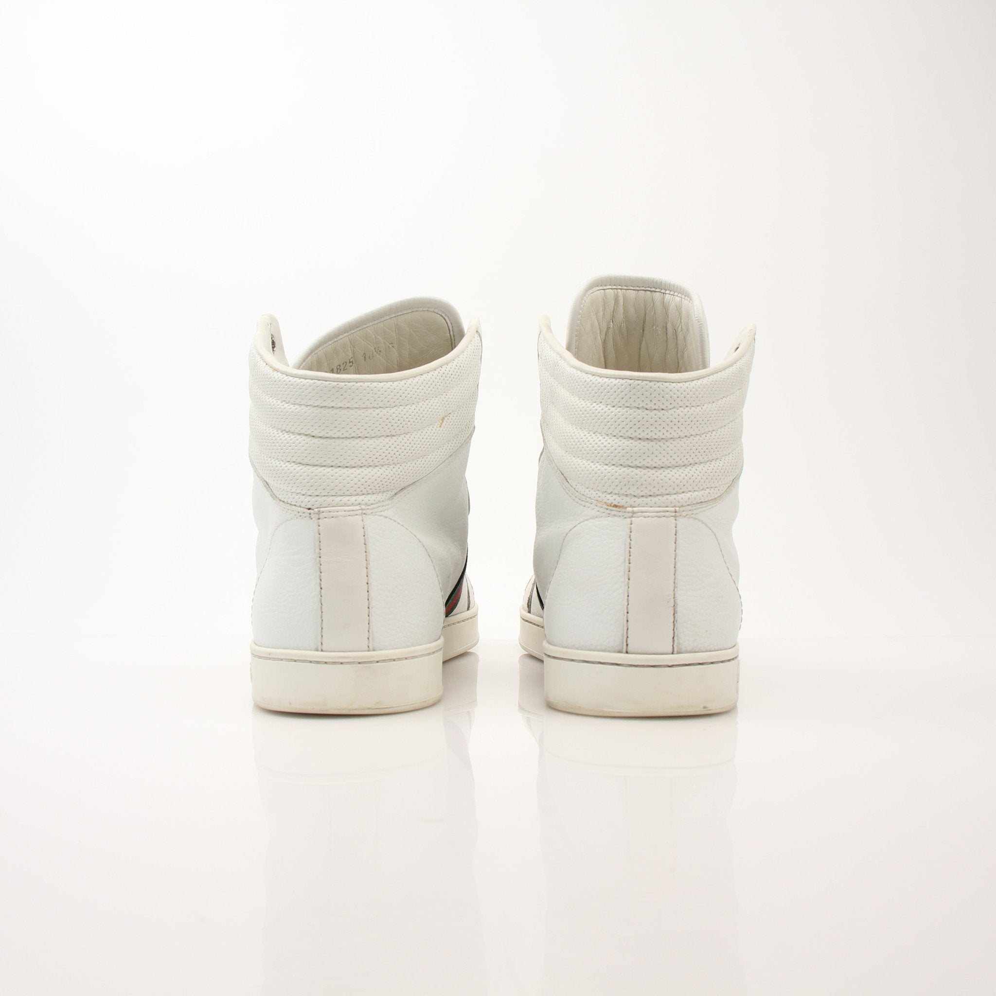 Gold & Beyond men's Gucci signature high-top sneakers with stylish design, leather material, and iconic branding visible in the image.