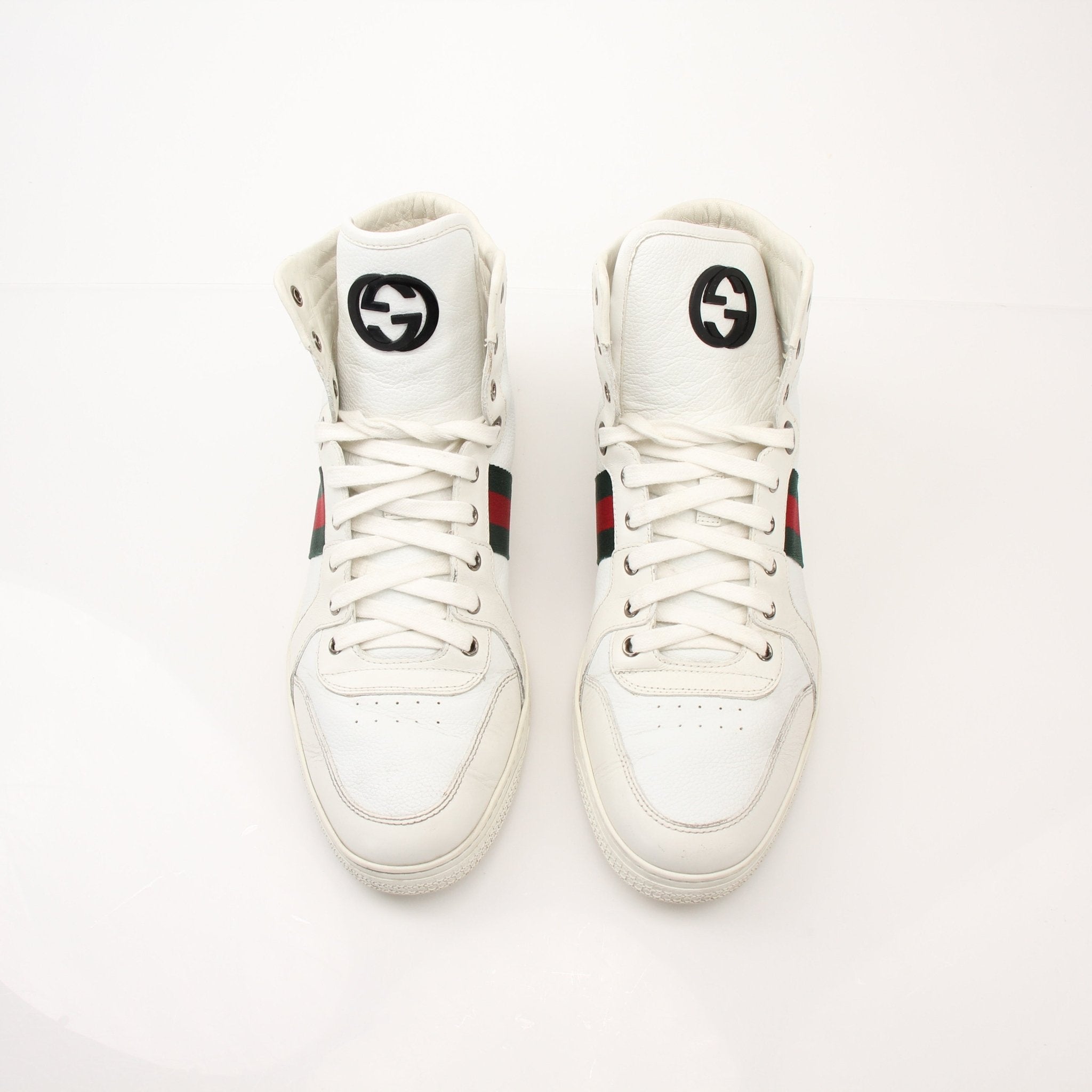 Gold & Beyond Gucci men's signature high-top sneakers with white laces and logo details, stylish shoes for men.