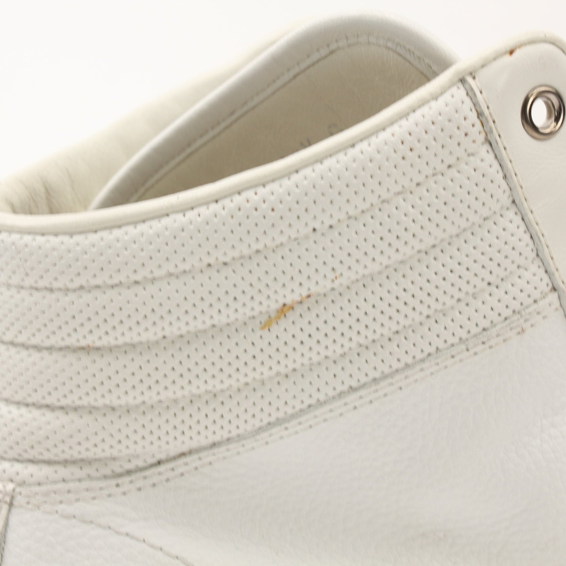 Gold & Beyond men's Gucci Signature high-top sneakers featuring white leather, black accents, and iconic branding details.