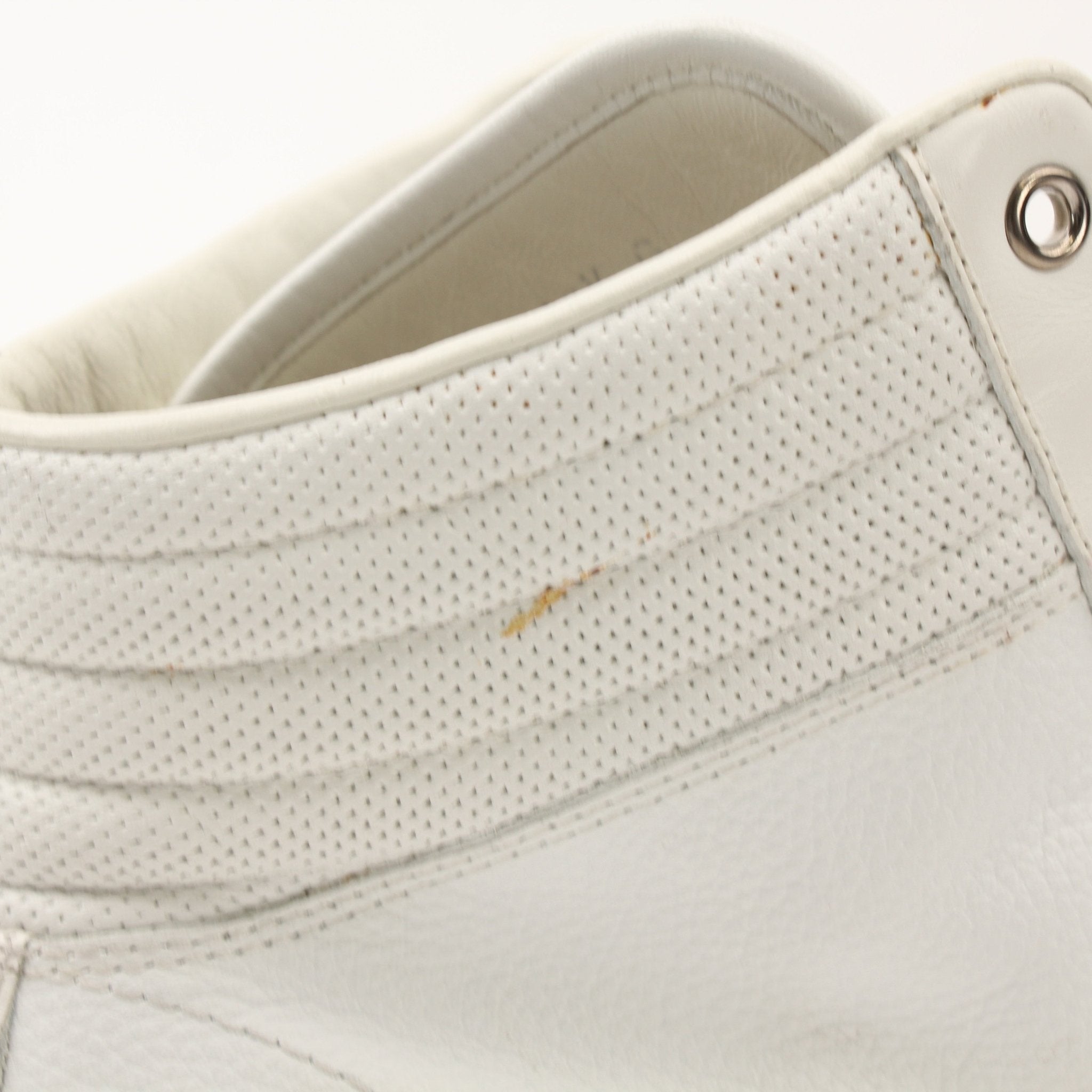 Gold & Beyond men's Gucci Signature high-top sneakers featuring white leather, black accents, and iconic branding details.
