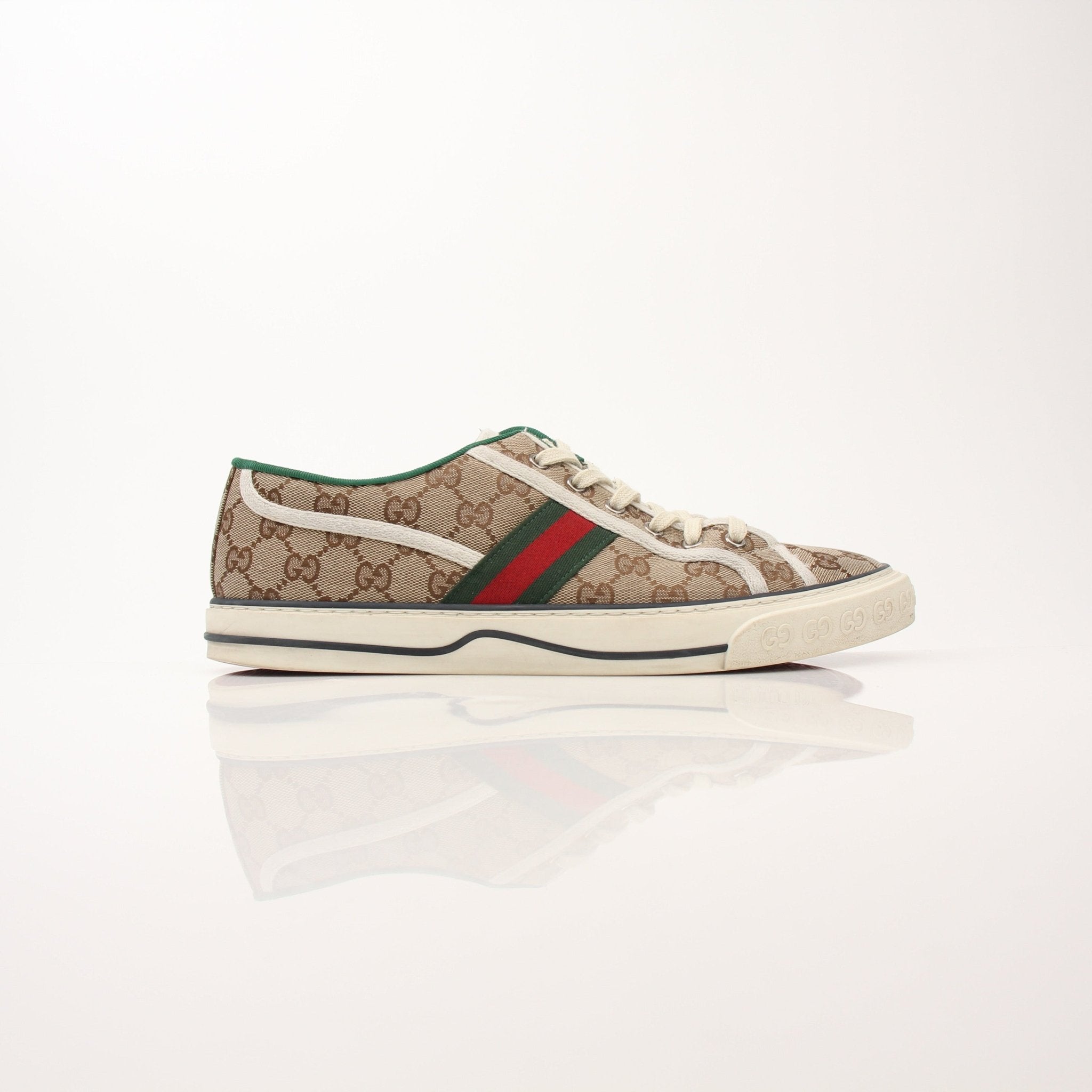 Gold & Beyond Gucci men's GG Tennis 1977 low-top sneakers with white leather and signature design, casual athletic shoes.