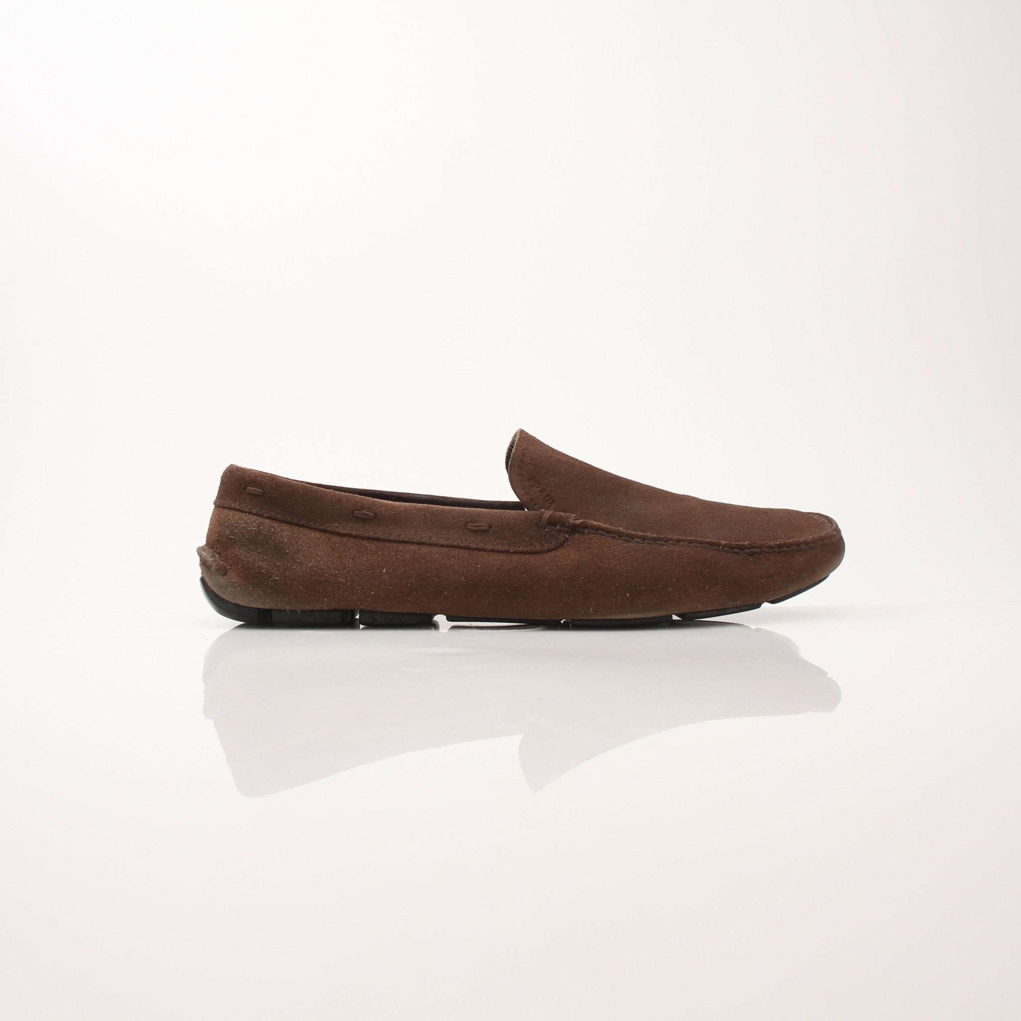 Gold & Beyond Prada men's driving suede loafers, stylish shoes with a sleek design and comfortable fit, shown in the image.