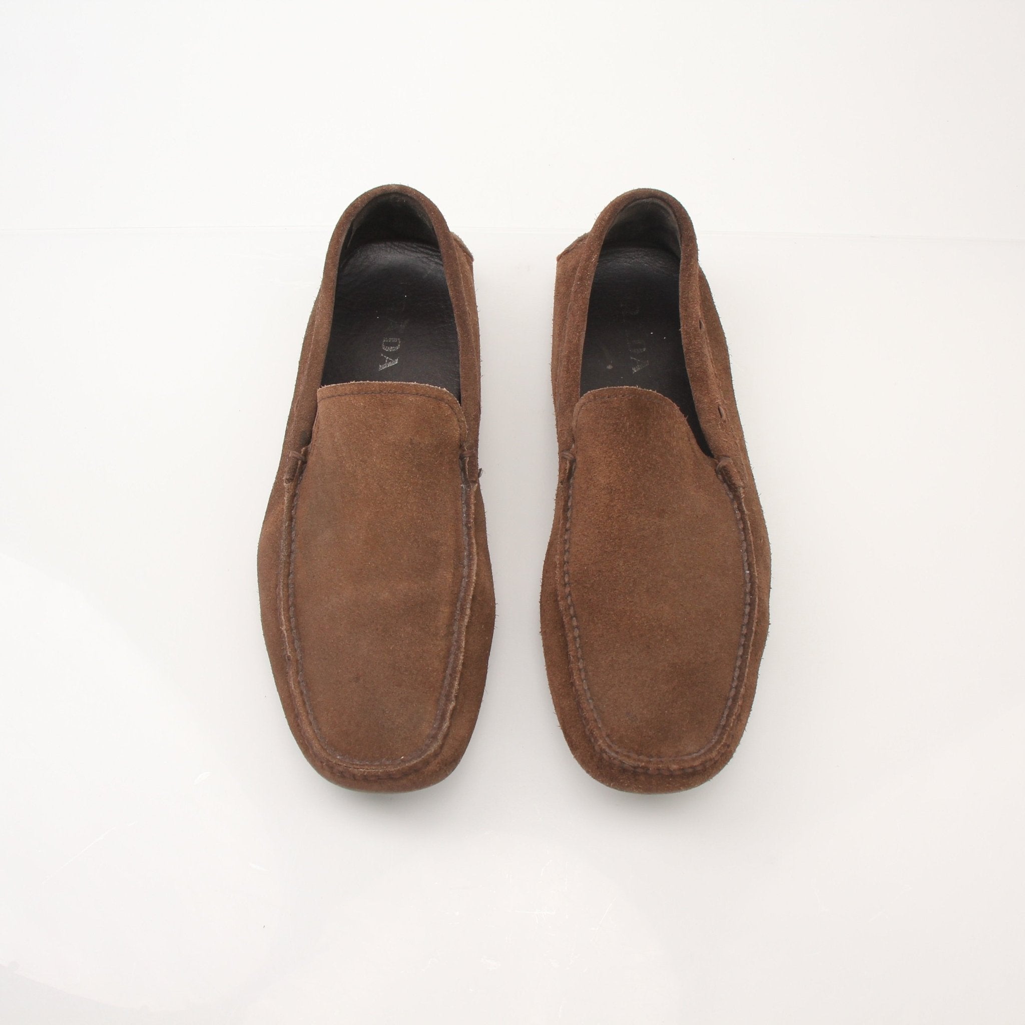 Gold & Beyond Prada men's driving suede loafers, stylish slip-on shoes with sleek design and comfortable fit.
