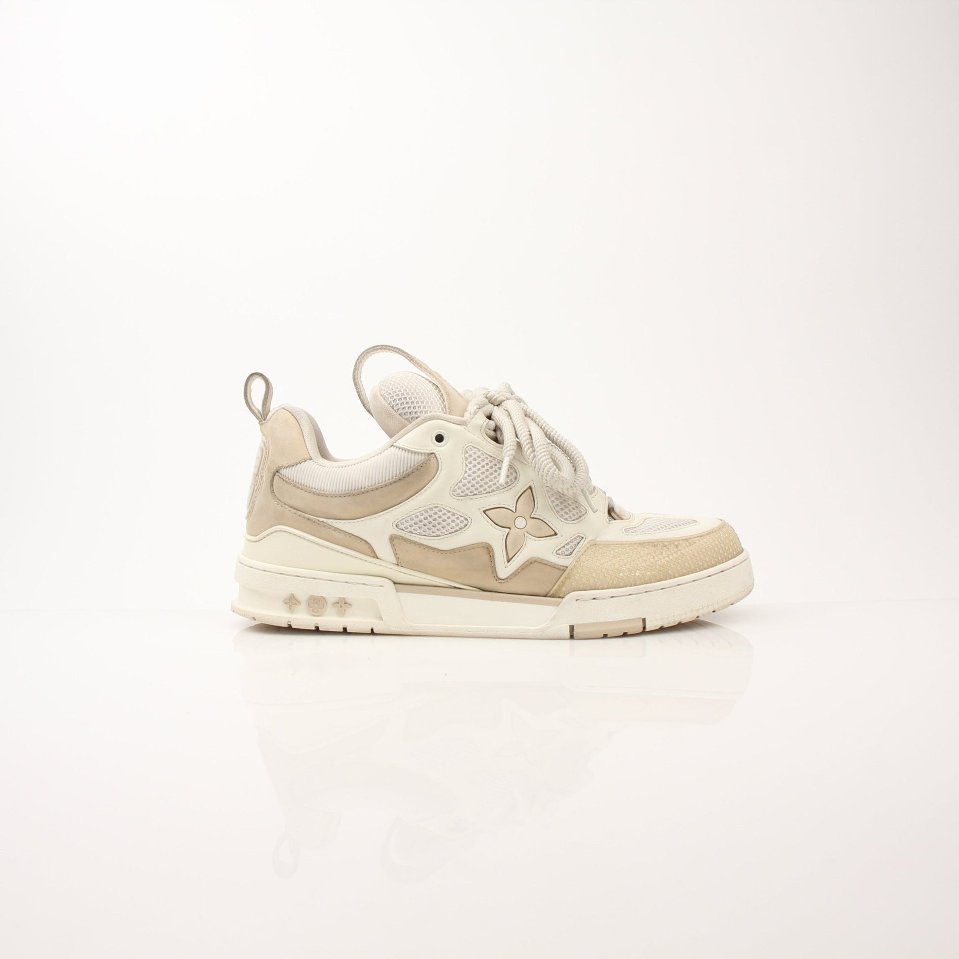Louis Vuitton men's LV Skate sneakers by Gold & Beyond, showcasing sleek design and stylish footwear with LV branding.