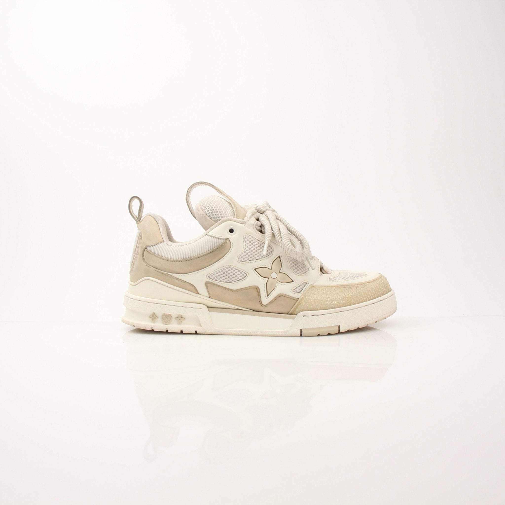 Louis Vuitton men's LV Skate sneakers by Gold & Beyond, showcasing sleek design and stylish footwear with LV branding.