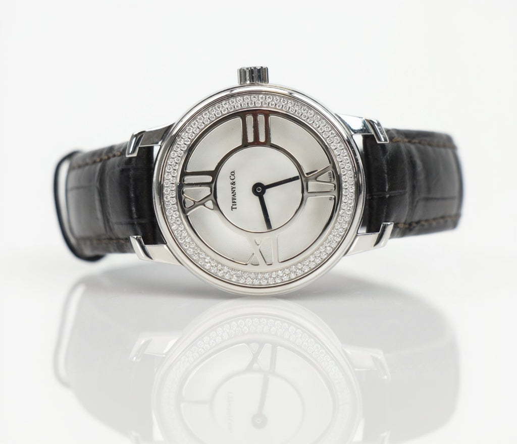 Gold & Beyond Tiffany Atlas Diamond Watch with a sleek gold band and sparkling diamond accents on the watch face.