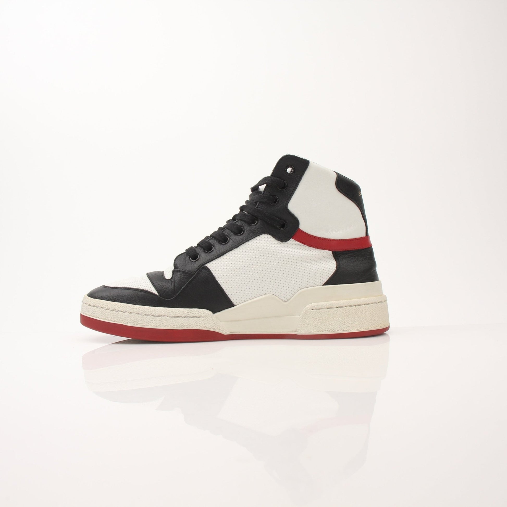 Gold & Beyond Saint Laurent Men's SL-24 Leather Sneakers, stylish black shoes with sleek leather design and white sole.