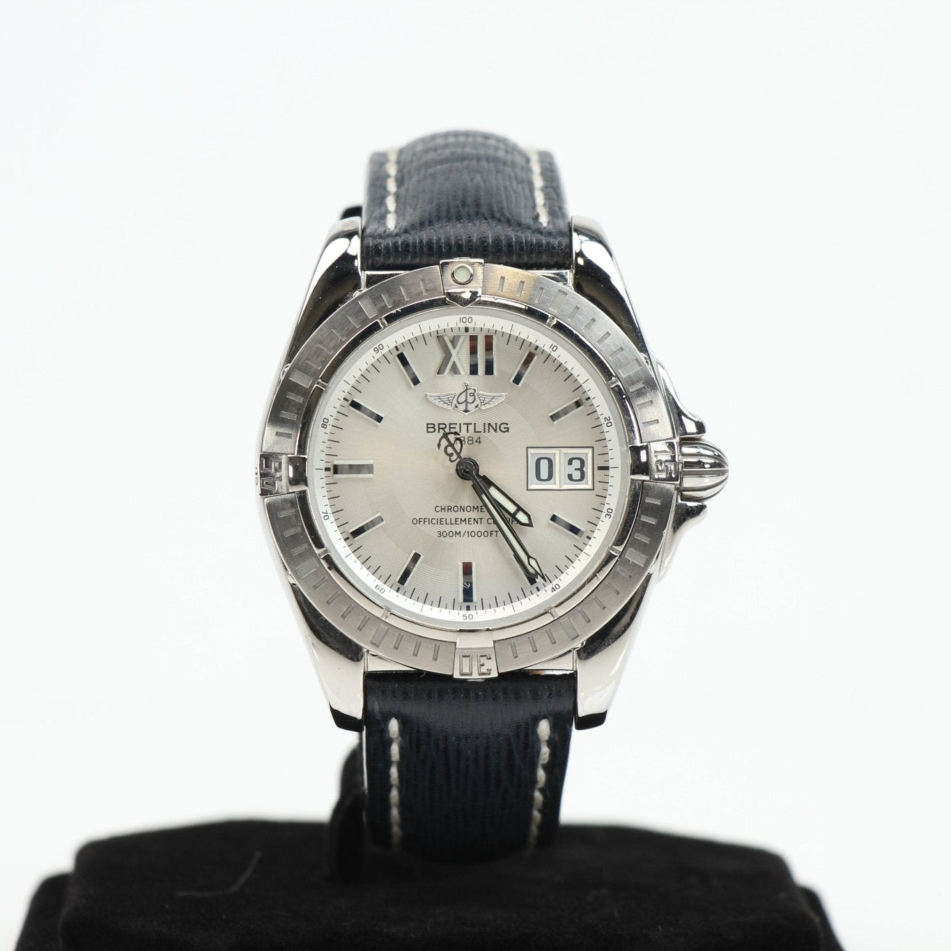 Breitling Galactic 41 watch with stainless steel case, black dial, and silver bracelet, showcasing luxury timepiece design.