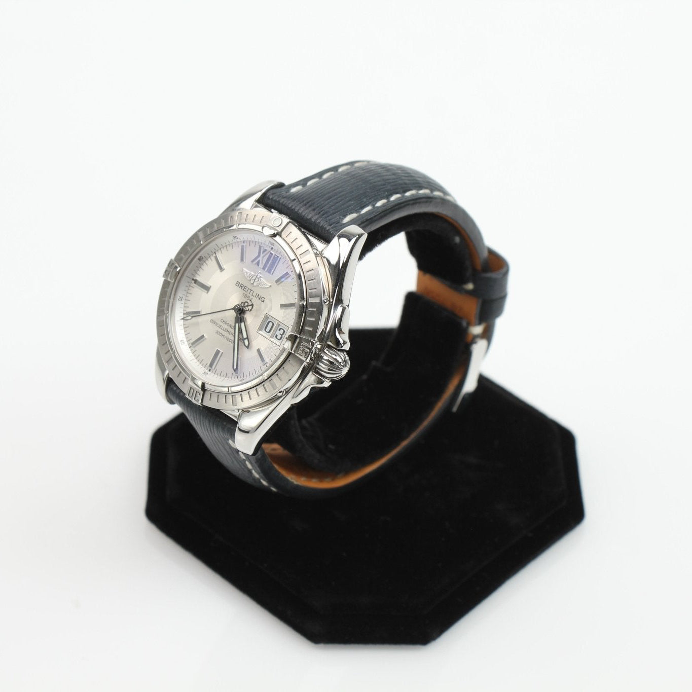 Breitling Galactic 41 watch with stainless steel case, black dial, and silver markers, displayed on a wrist.