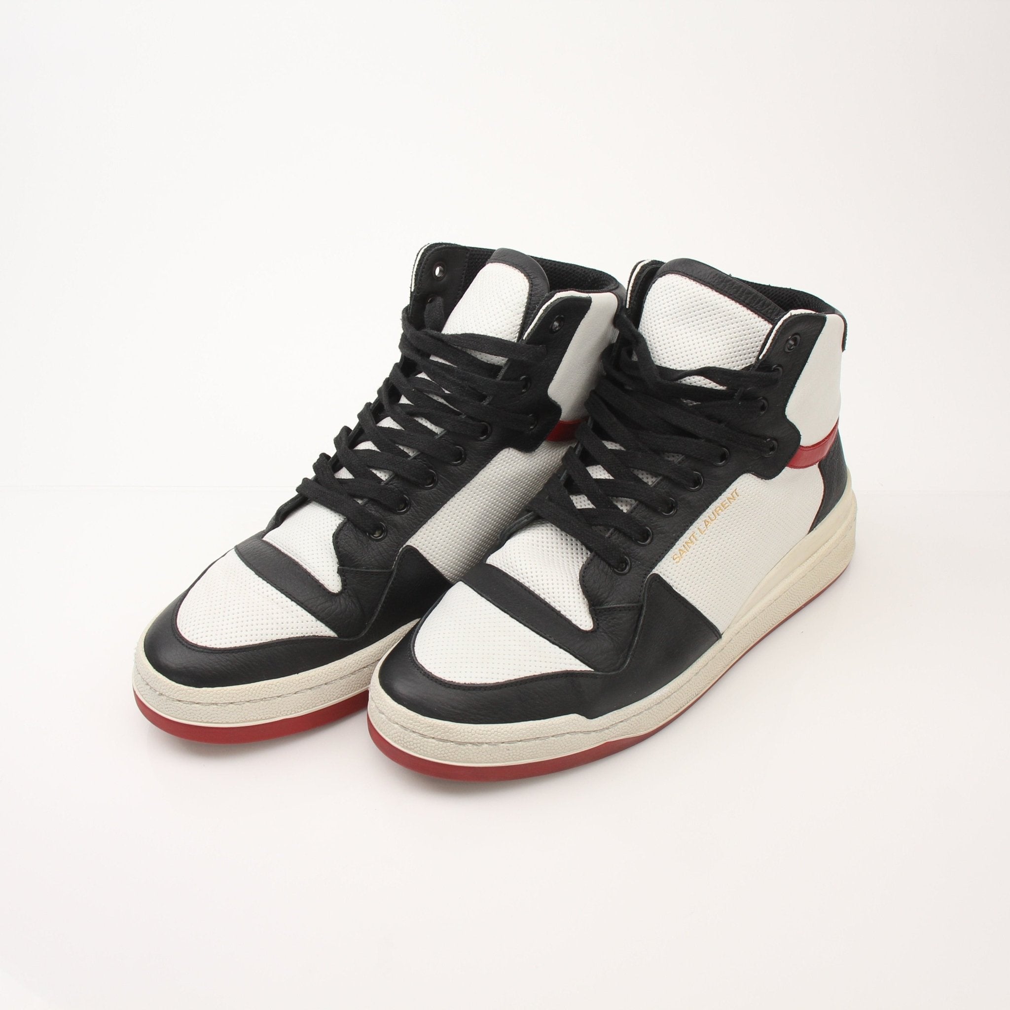 Gold & Beyond Saint Laurent SL-24 men's leather sneakers, sleek black shoes with white soles and stylish design.