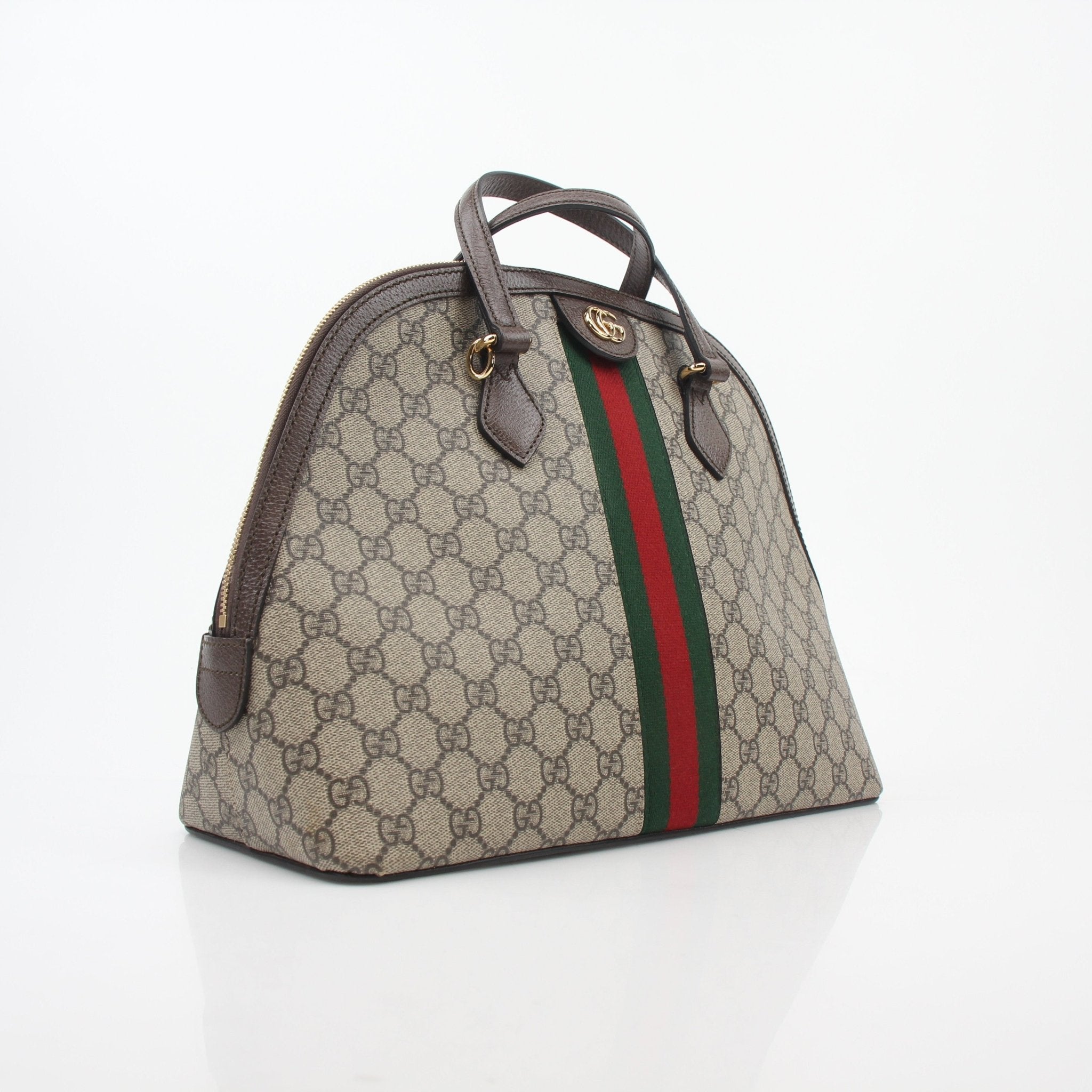 Gucci Beige and Ebony Ophidia GG medium top handle handbag with leather trim and gold hardware, designed for stylish carrying.