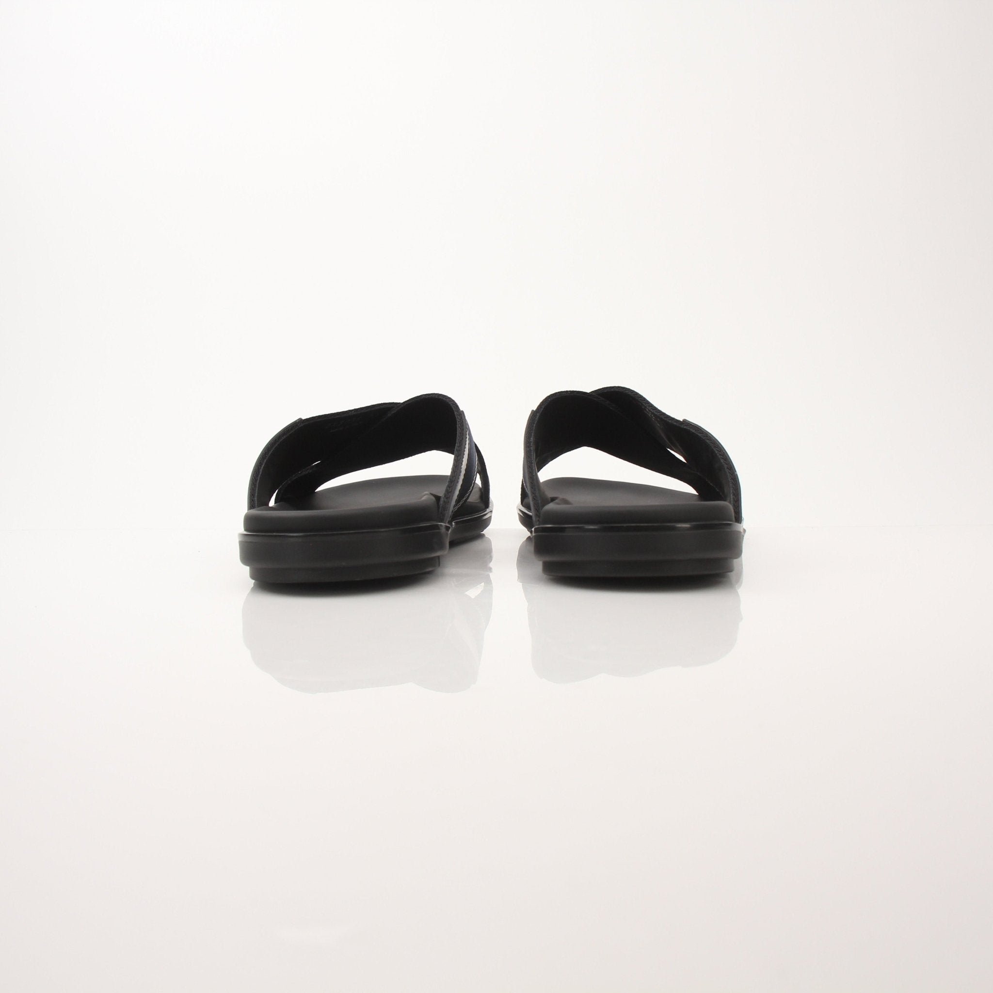 Prada men's leather and Re-Nylon sandals with adjustable straps and open toe design, displayed on a neutral background.