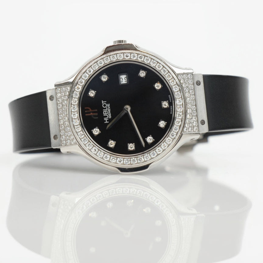 Hublot Classic Fusion GTS Diamond watch with gold-tone case and diamond accents, showcasing a luxurious timepiece.