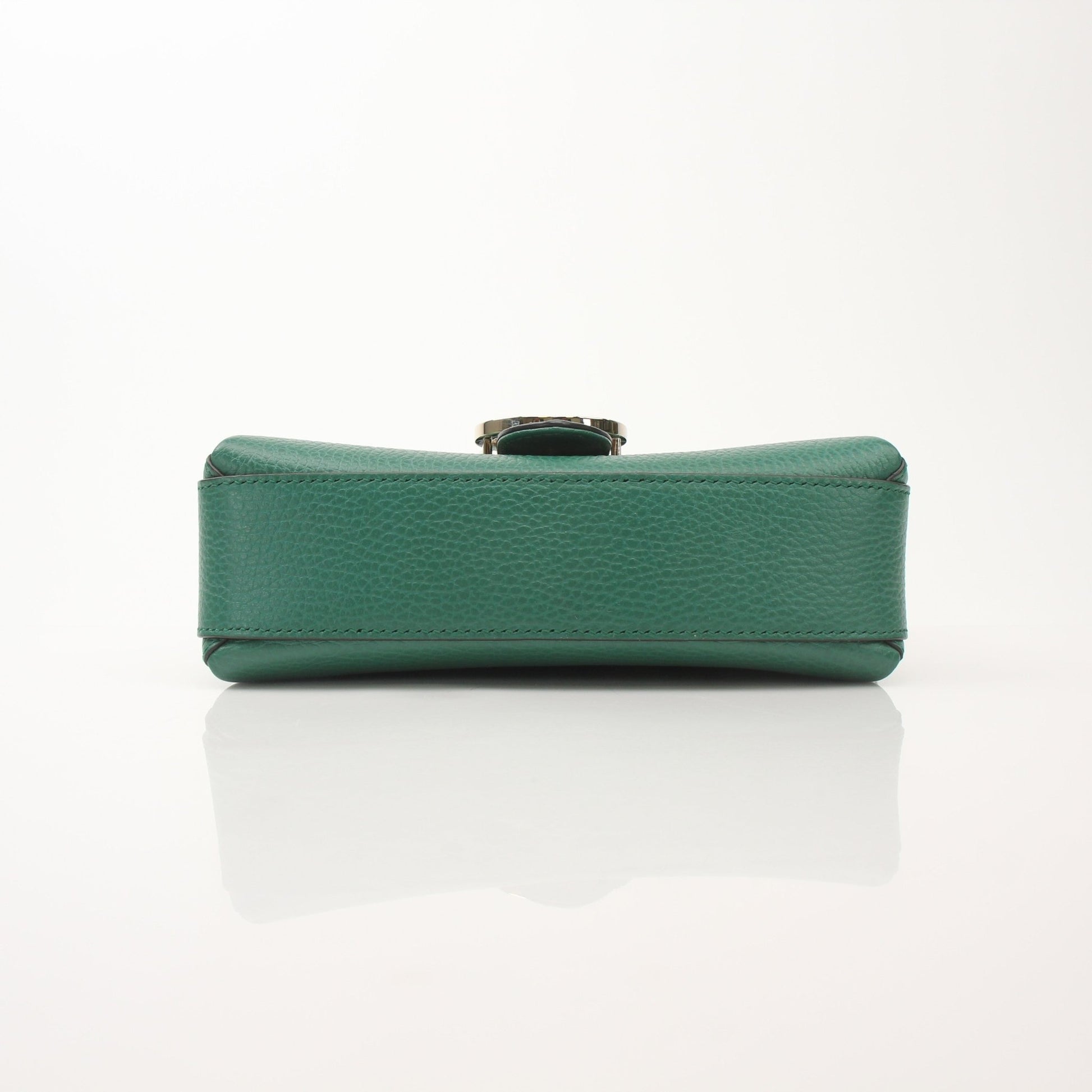 Gold & Beyond Gucci Dollar Calfskin Interlocking G crossbody handbag with gold hardware and adjustable strap.