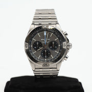 Breitling Chronomat B01 titanium watch with black dial and stainless steel bracelet, showcasing a luxury chronograph timepiece.