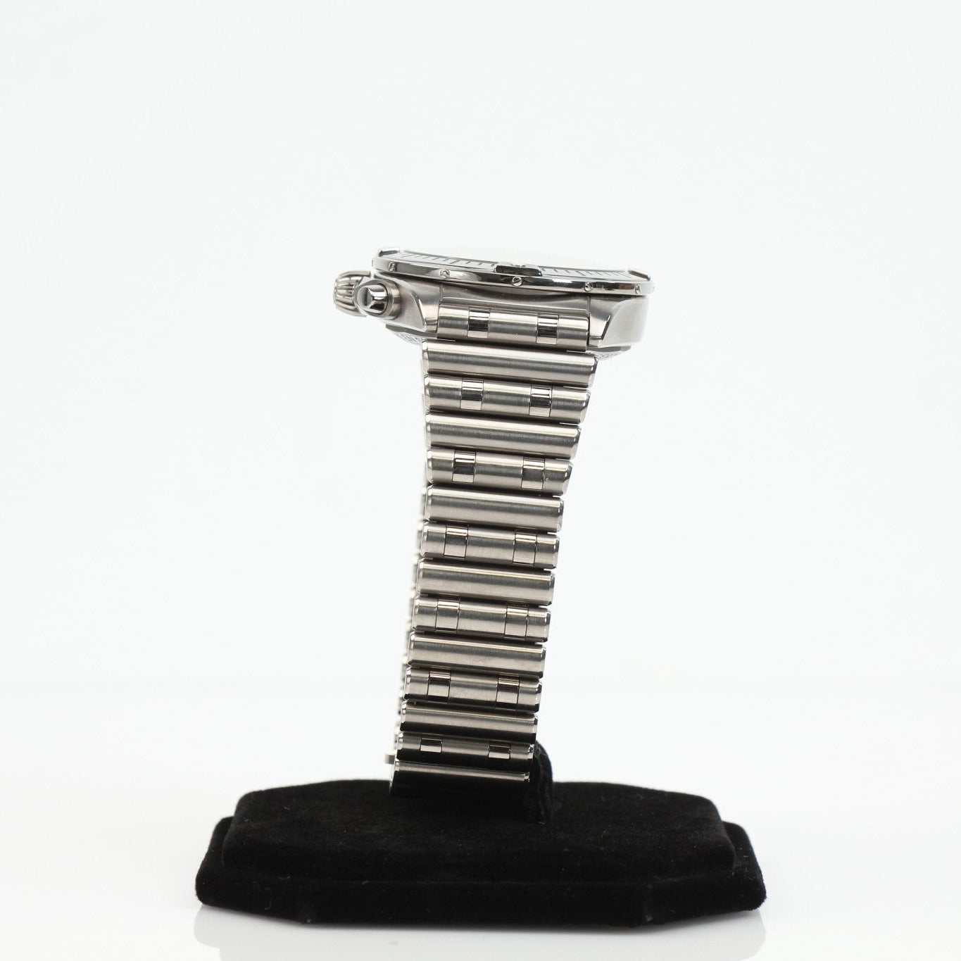 Titanium Breitling Chronomat B01 watch with black dial and stainless steel bracelet, showcasing luxury men's wristwatch design.