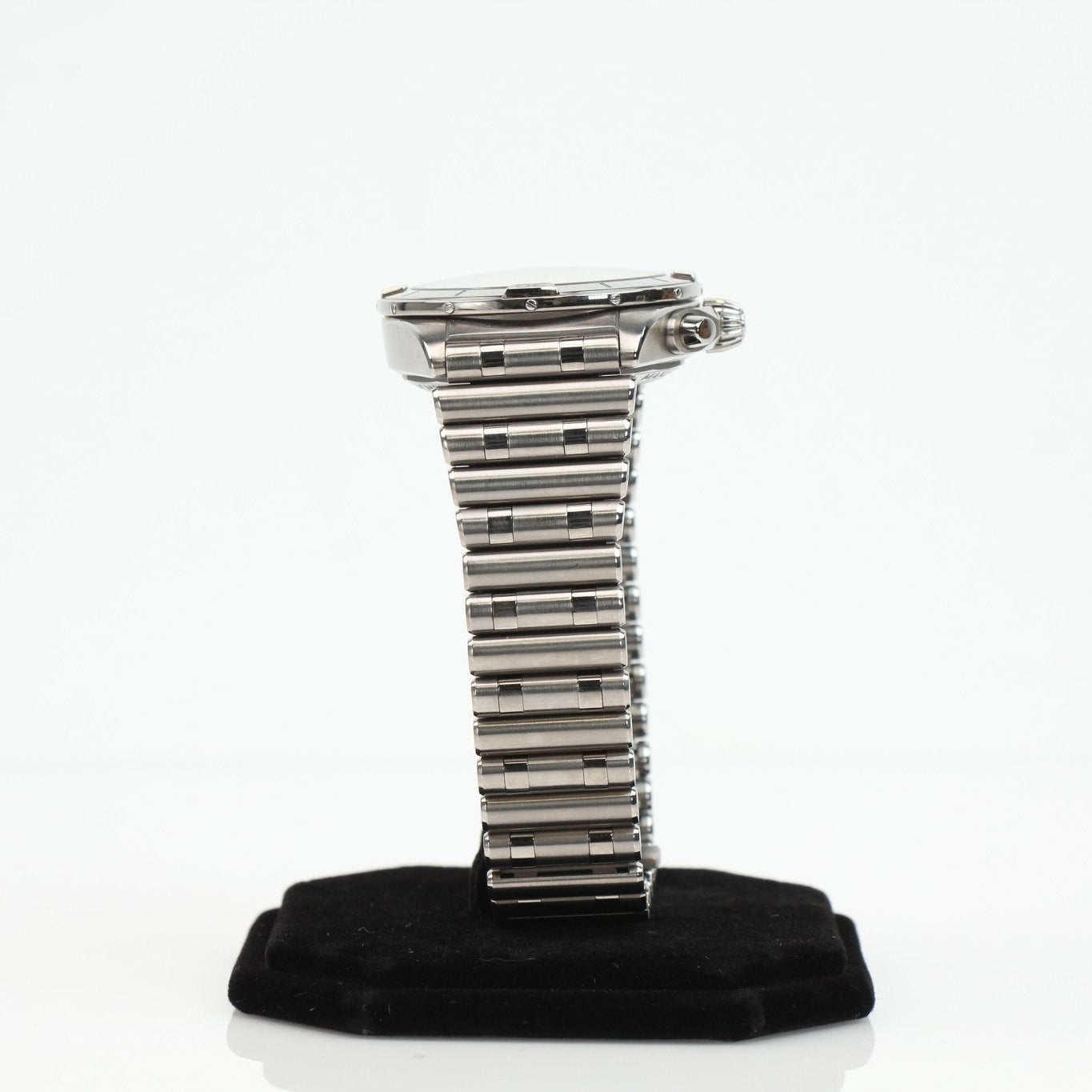 Titanium Breitling Chronomat B01 wristwatch with black dial and chronograph features, displayed on a leather strap.