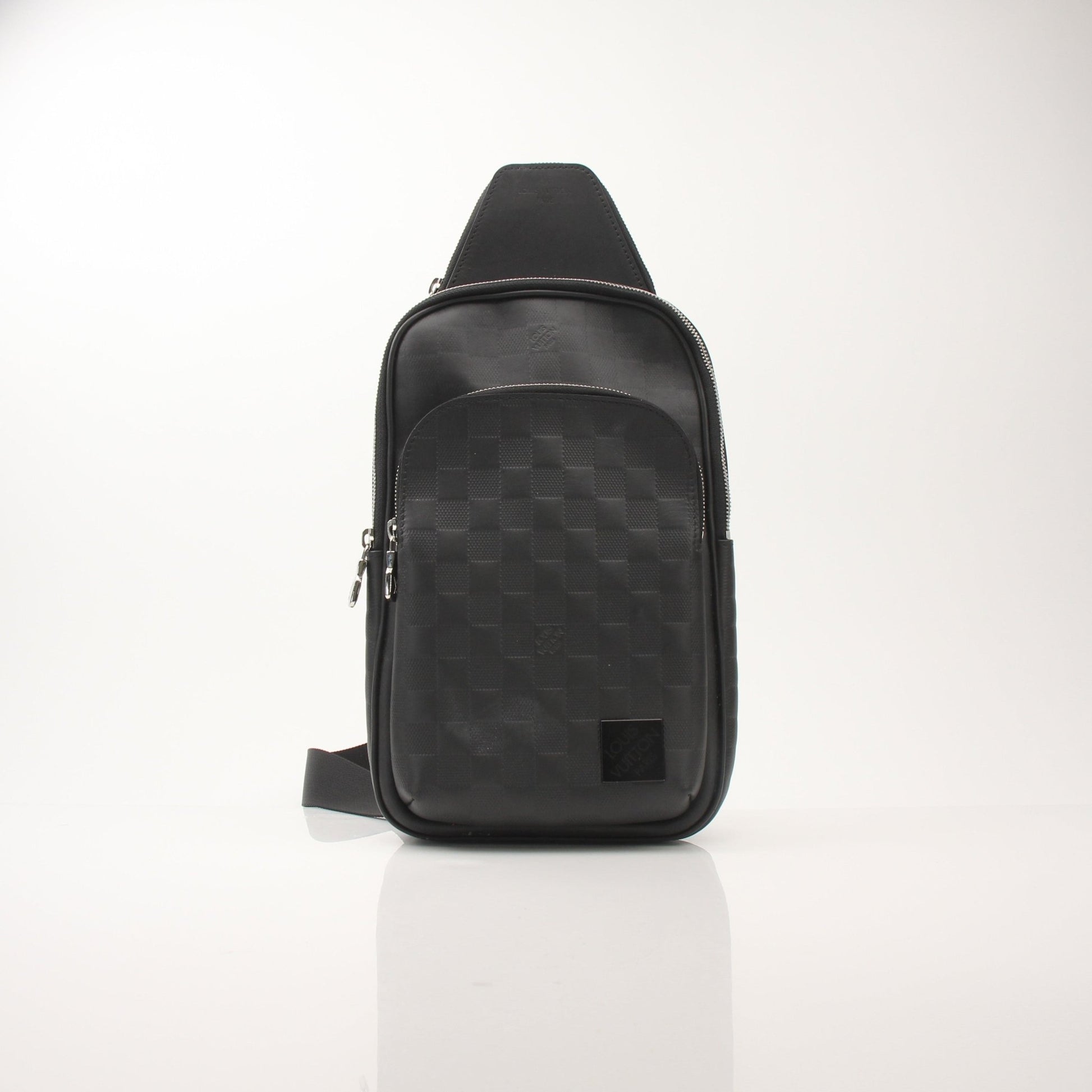 Louis Vuitton Damier Infini Avenue Sling Bag for men, stylish travel bag with checkered pattern and adjustable strap.