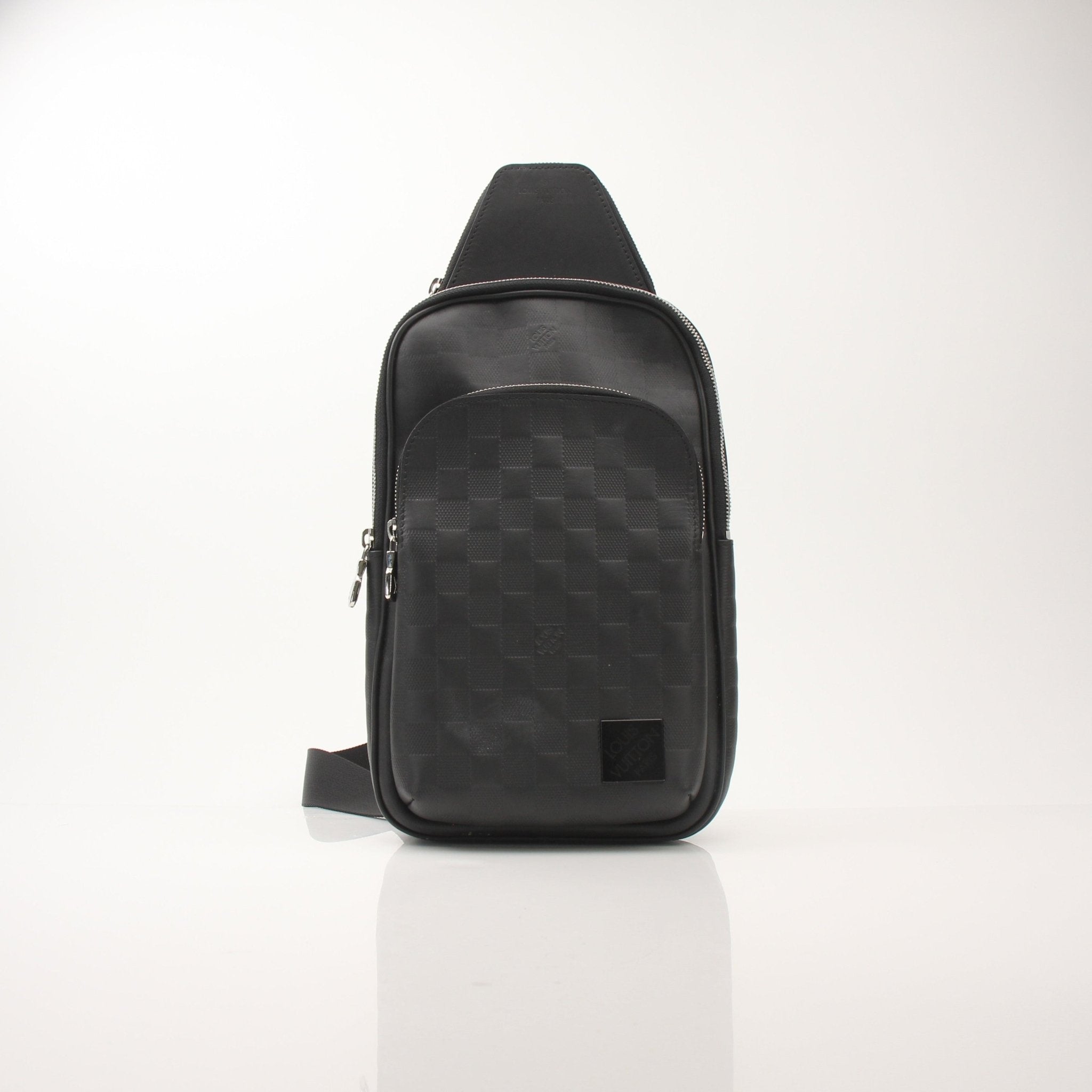Louis Vuitton Damier Infini Avenue Sling Bag for men, stylish travel bag with checkered pattern and adjustable strap.