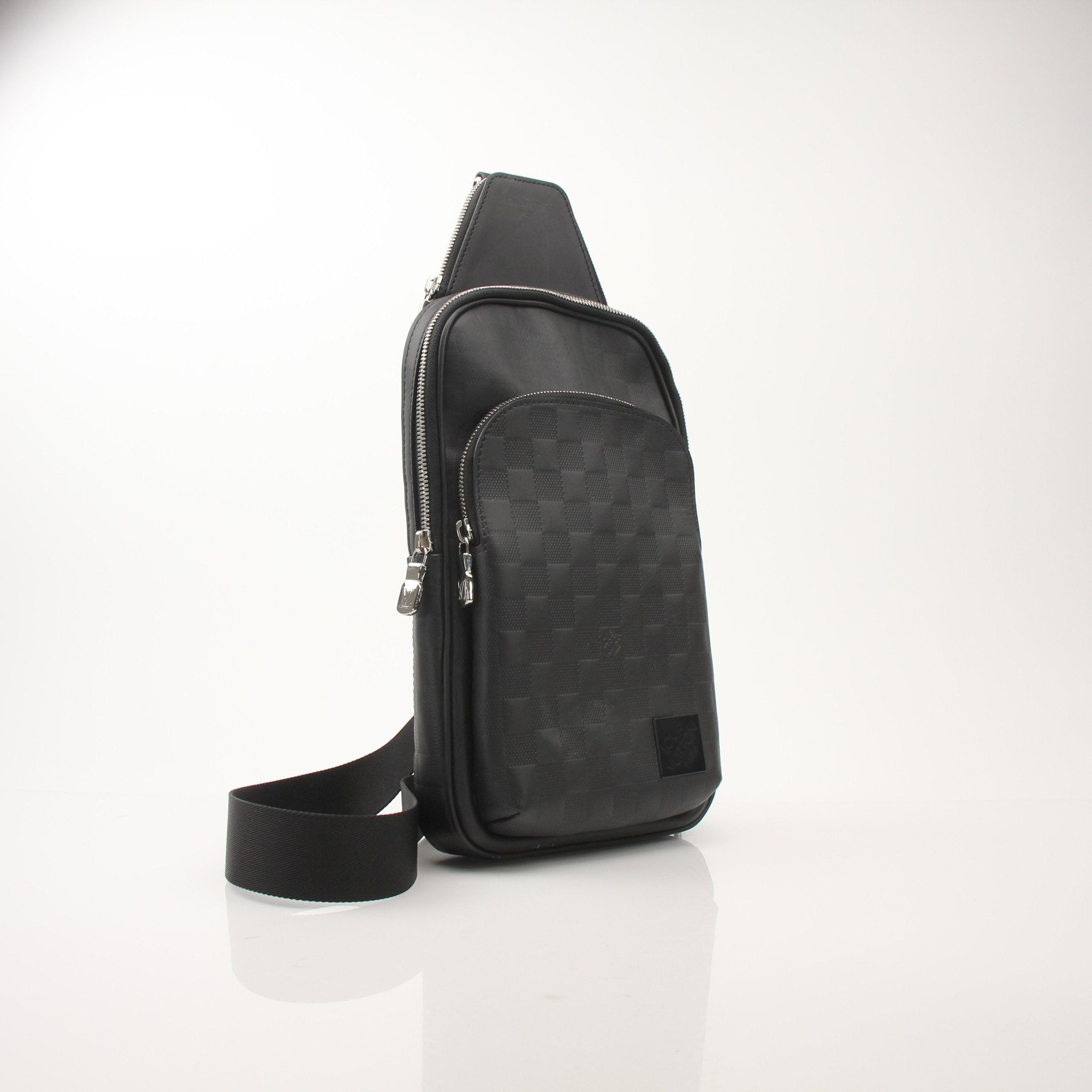 Louis Vuitton men's Damier Infini Avenue sling bag in brown with adjustable strap, designed for travel and everyday use.
