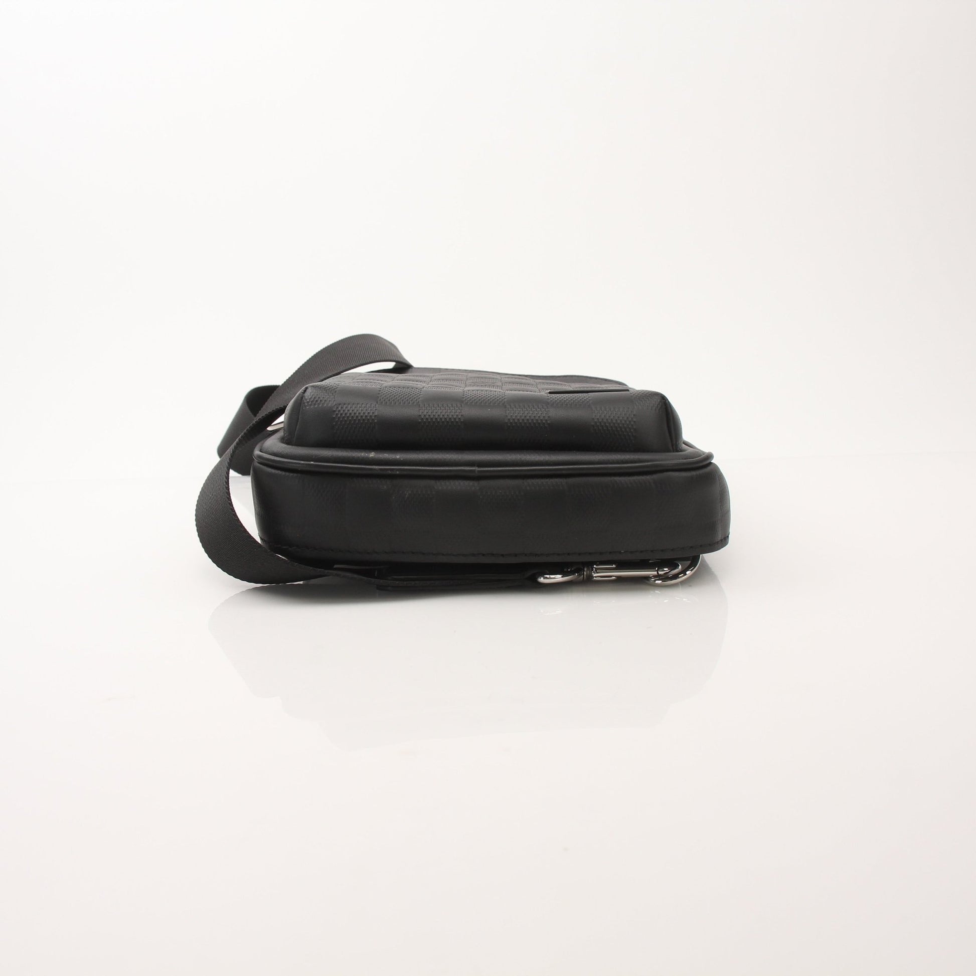 Louis Vuitton men's Damier Infini Avenue sling bag for travel, featuring classic checkered pattern and adjustable strap.