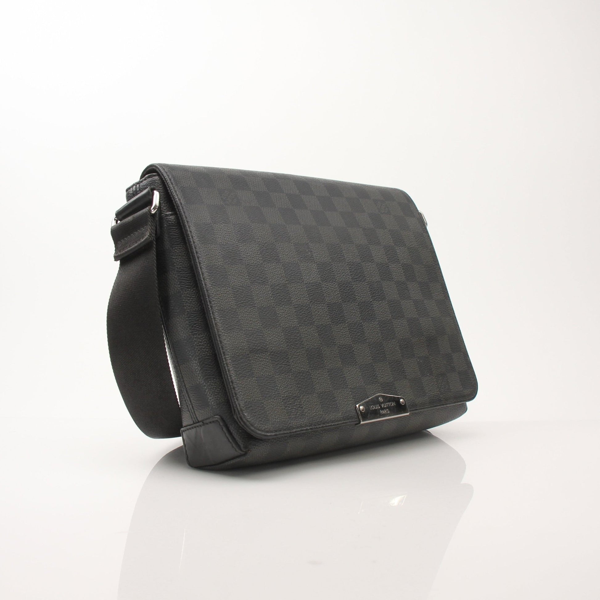 Gold & Beyond Louis Vuitton District PM messenger bag for travel, featuring signature monogram canvas and adjustable strap.
