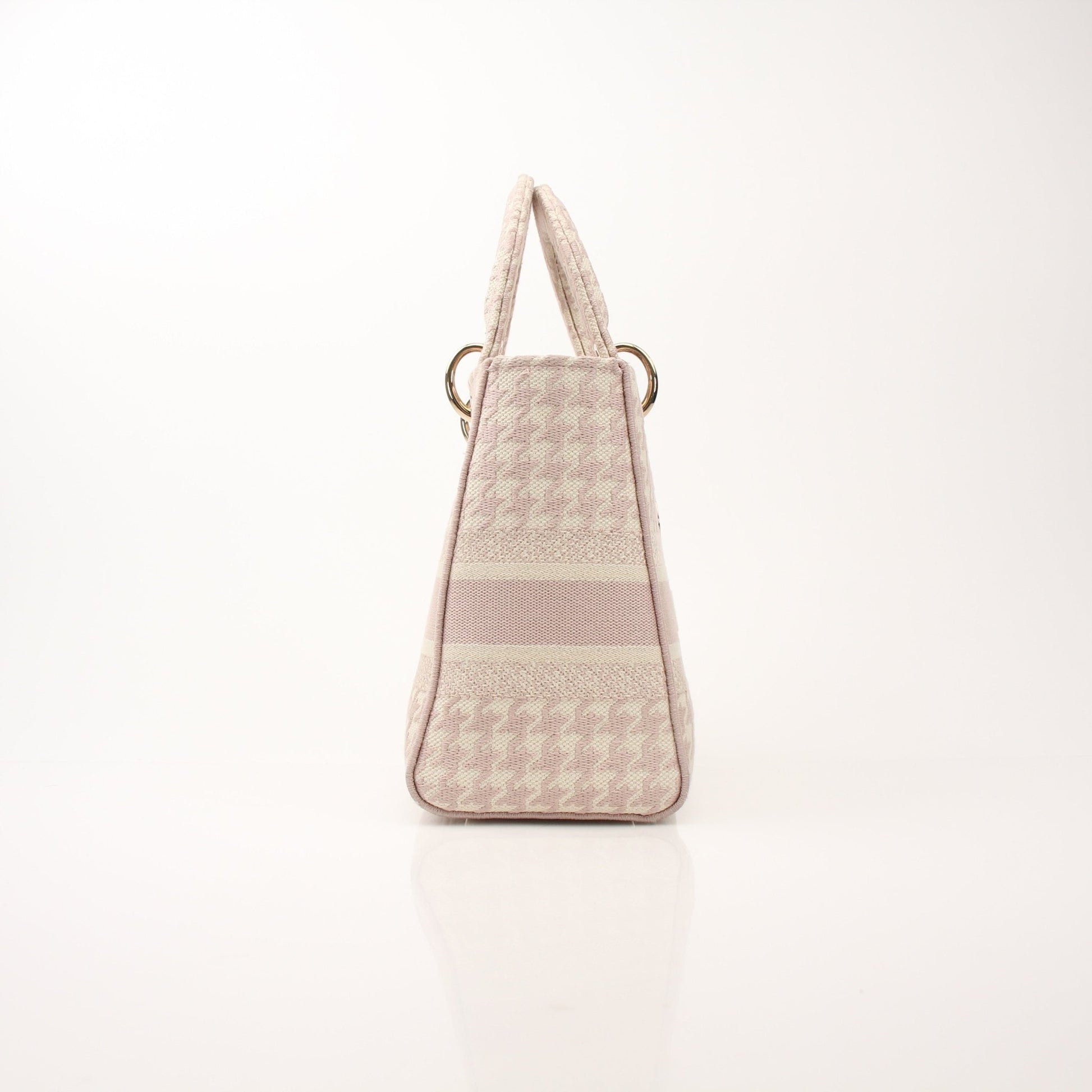 Christian Dior Embroidered Canvas Lady D-Lite Handbag with gold accents and intricate embroidery, showcasing a stylish and elegant design.
