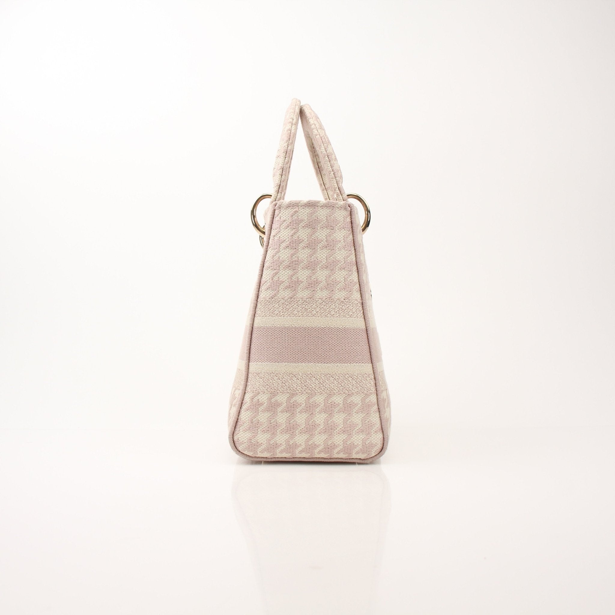 Christian Dior Embroidered Canvas Lady D-Lite Handbag with gold accents and intricate embroidery, showcasing a stylish and elegant design.