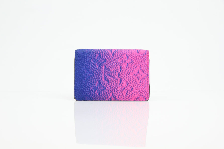 Louis Vuitton Pocket Organizer wallet in gradient monogram leather, showcasing elegant design and unique color blend.