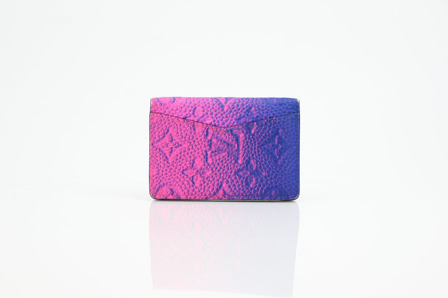 Louis Vuitton Pocket Organizer wallet in gradient monogram leather with multiple card slots and a sleek design.