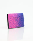 Louis Vuitton Pocket Organizer wallet in gradient monogram leather, showcasing its elegant design and compact size.