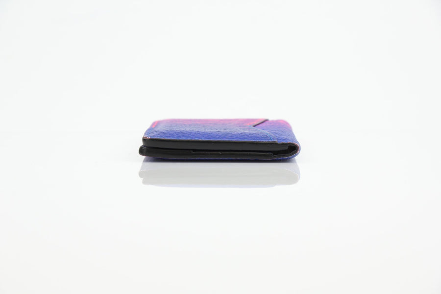 Louis Vuitton Pocket Organizer wallet in gradient monogram leather, showcasing its elegant design and compact size.