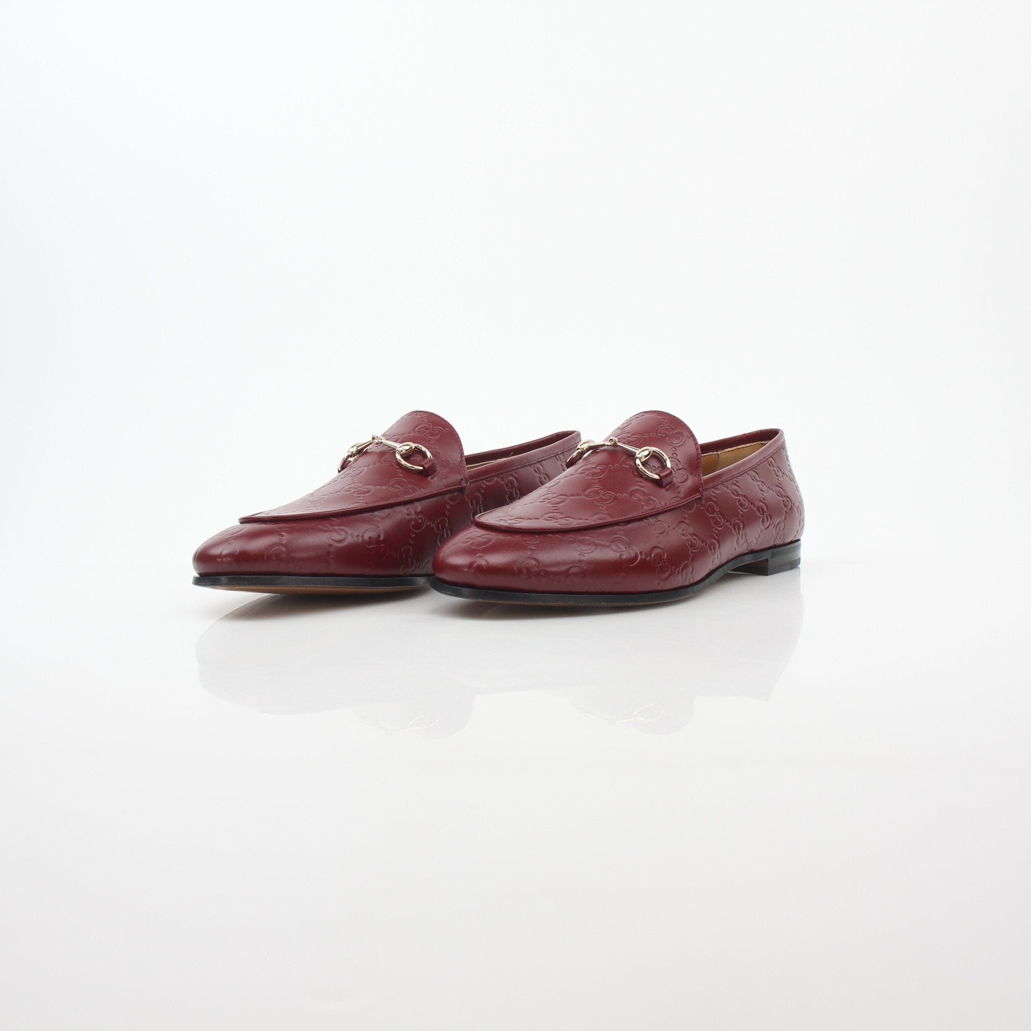 Gold & Beyond Gucci Burgundy Guccissima Horsebit Jordan Loafers shoes with classic design and luxurious leather finish.