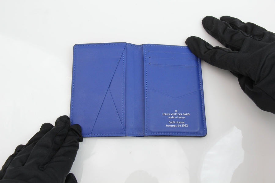 Louis Vuitton Pocket Organizer wallet in gradient monogram leather, showcasing elegant design and spacious interior.