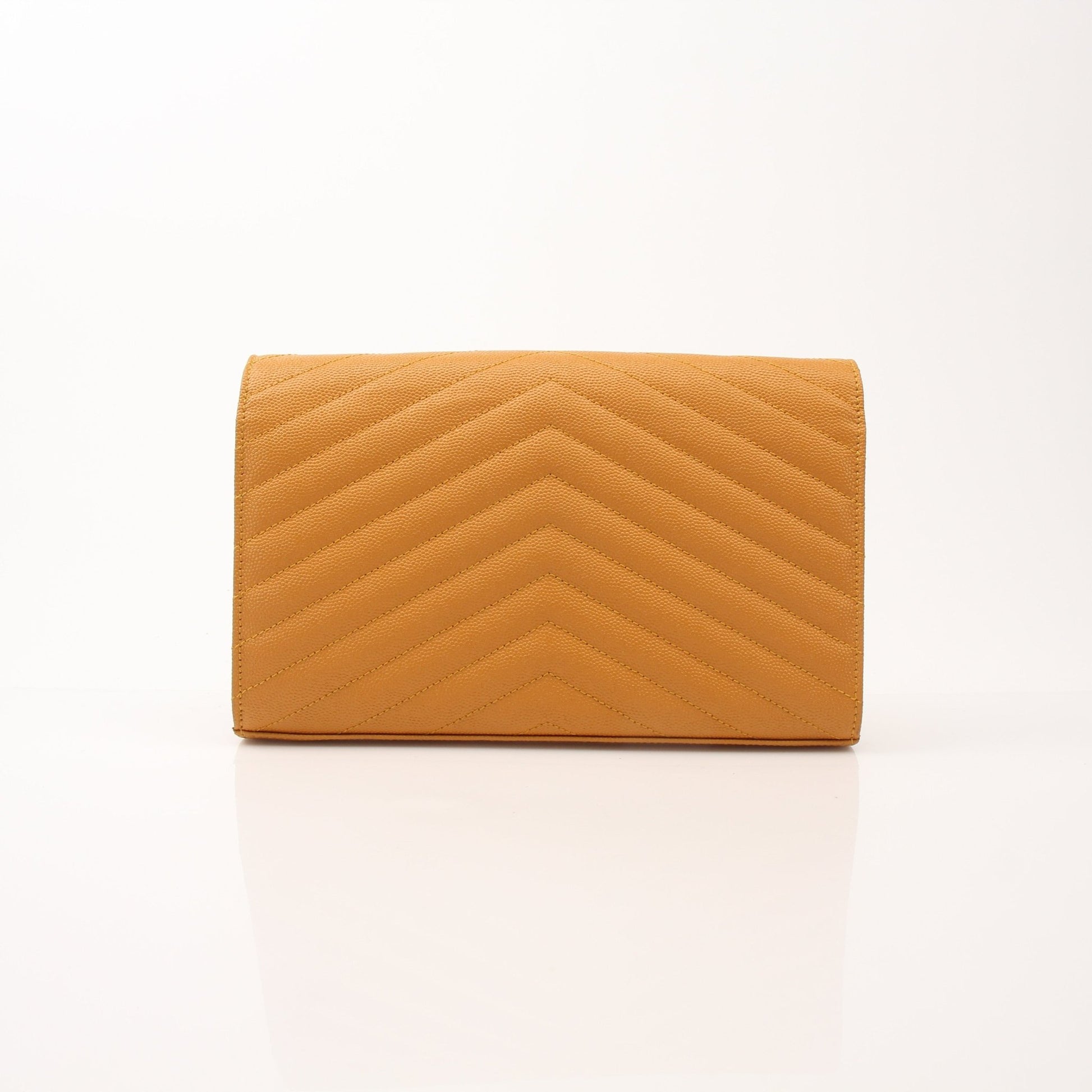 Saint Laurent Matelasse Chevron Monogram Chain Wallet handbag with gold-tone chain and quilted design, showing front view.