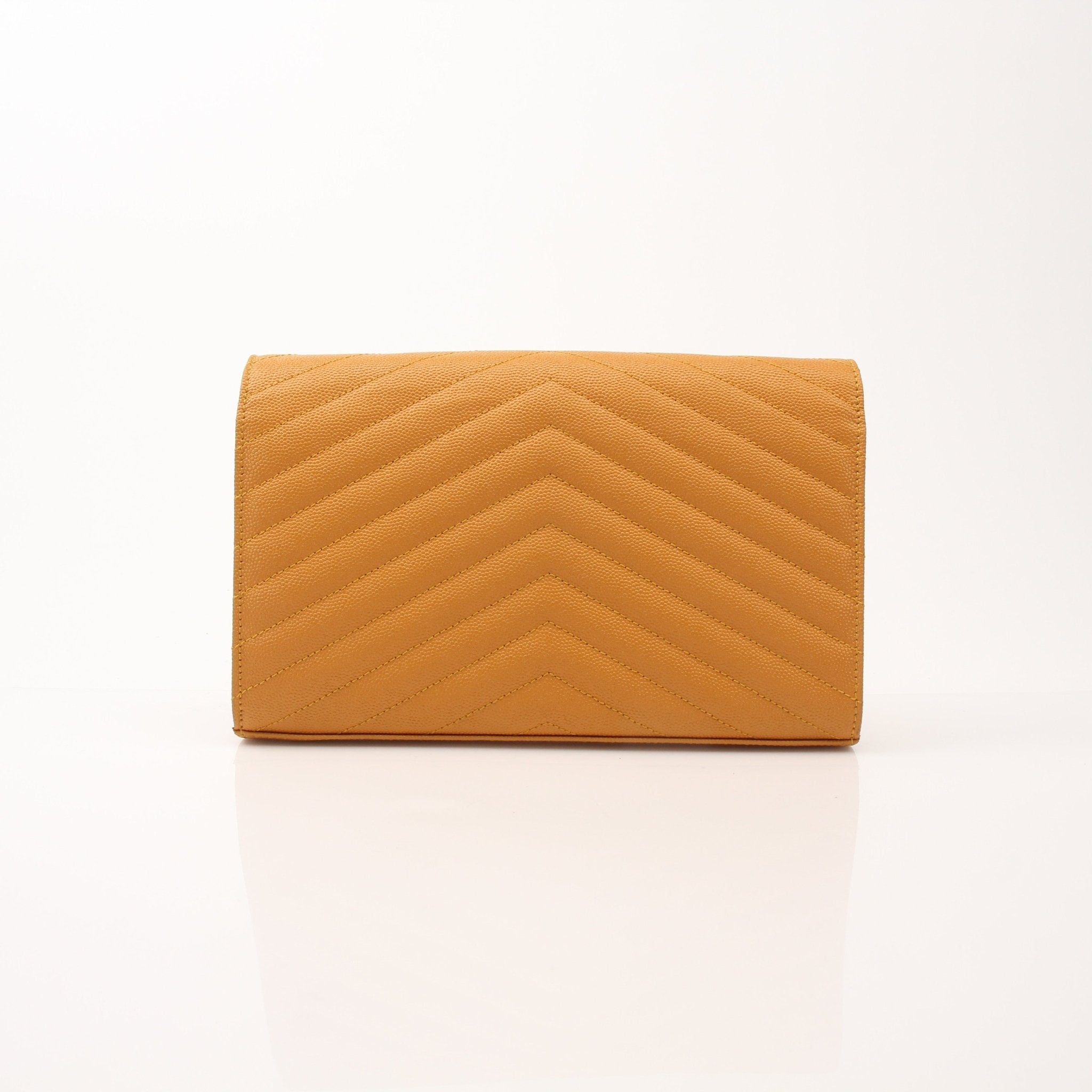 Saint Laurent Matelasse Chevron Monogram Chain Wallet handbag with gold-tone chain and quilted design, showing front view.