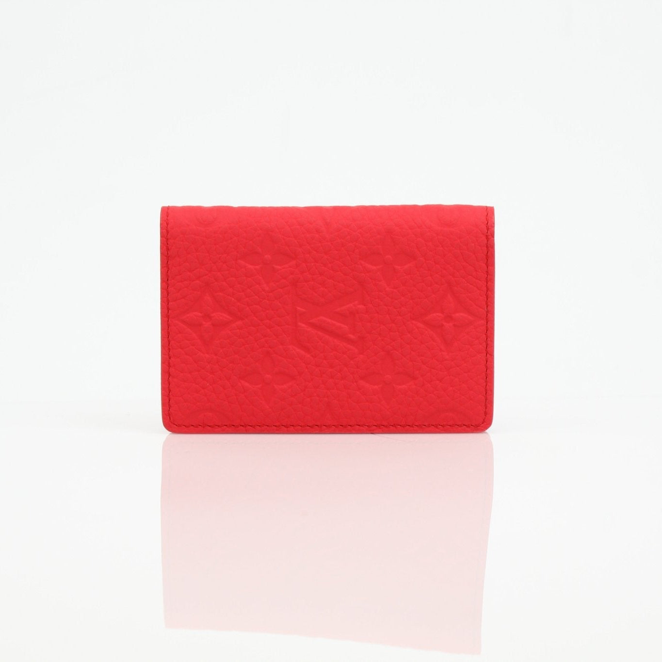 Louis Vuitton Red Empreinte leather pocket organizer card holder with multiple card slots and gold logo accents.