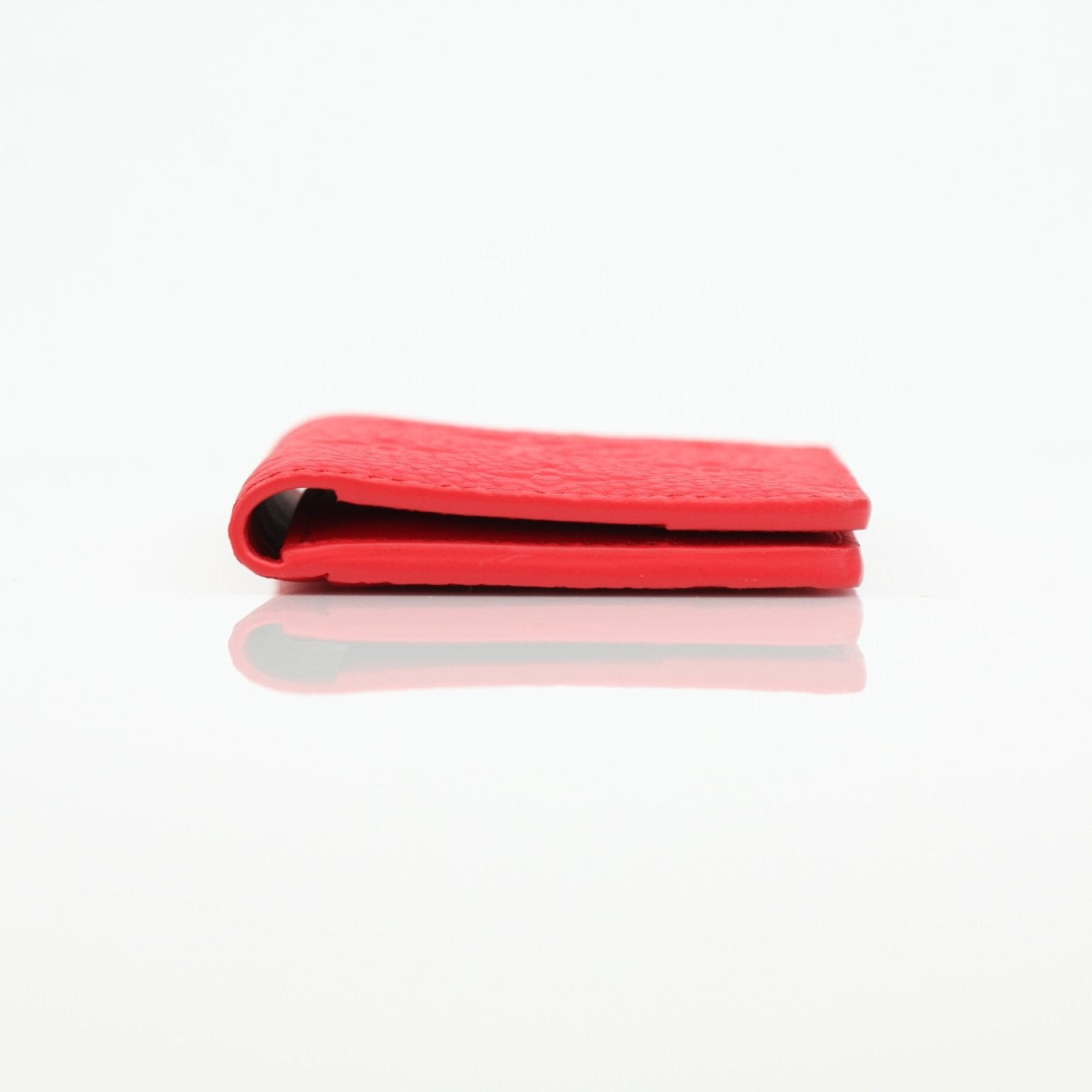 Red Louis Vuitton Empreinte pocket organizer card holder with multiple card slots and gold embossed logo.