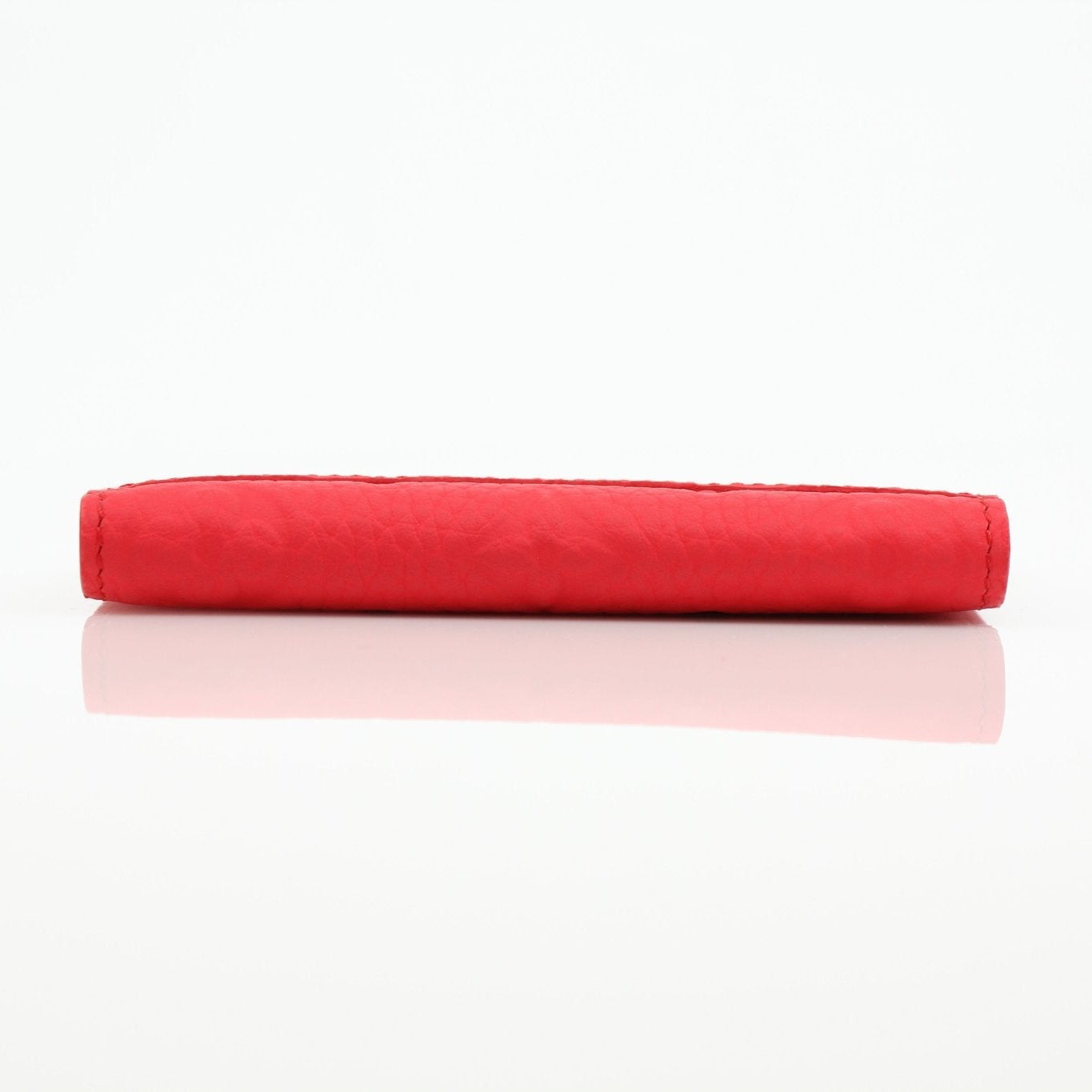 Louis Vuitton Red Empreinte pocket organizer card holder with multiple card slots and embossed leather details.