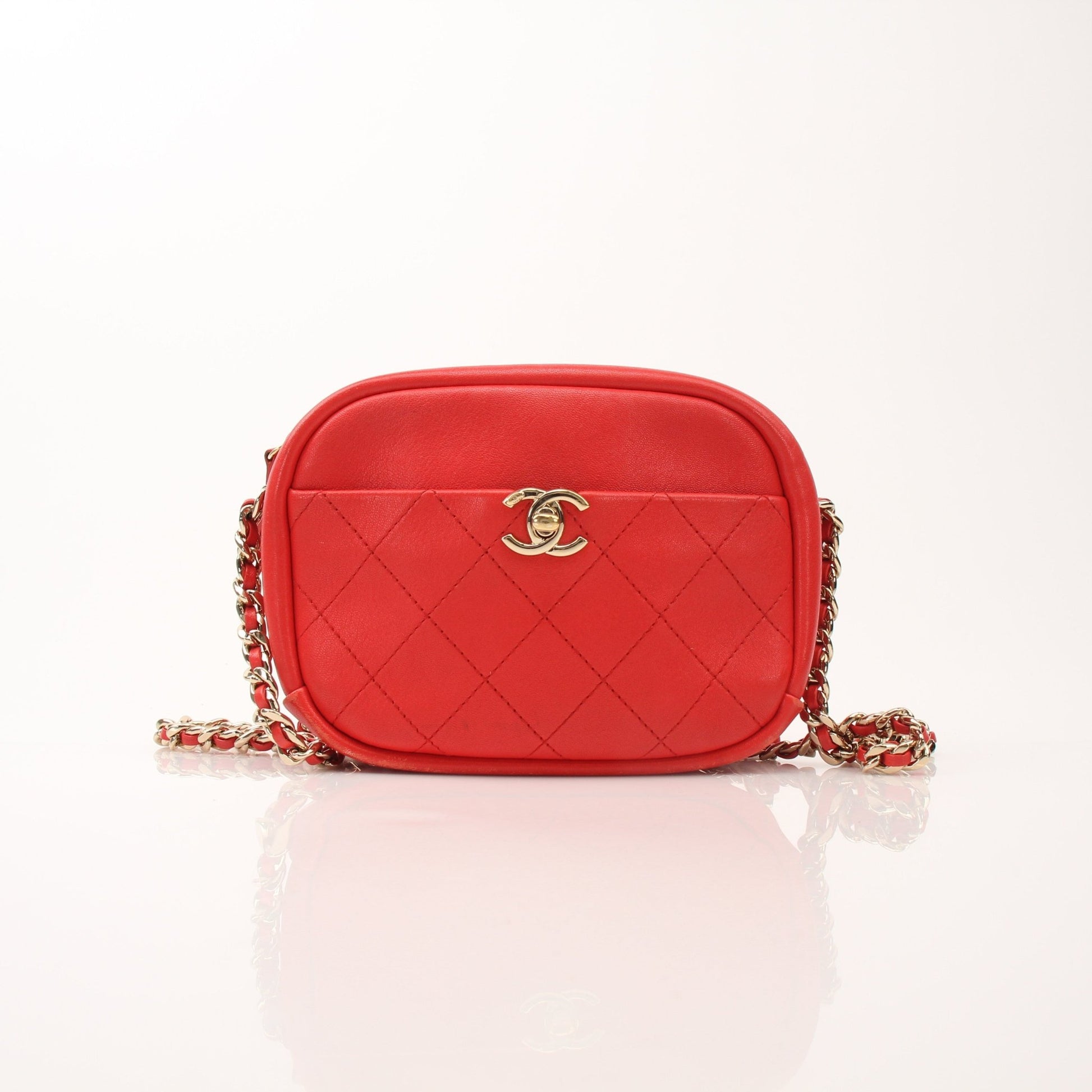 Chanel Quilted Goatskin Casual Trip Camera Bag handbag with gold chain strap and quilted design, black goatskin material, casual style