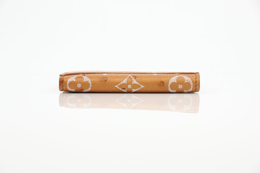 Louis Vuitton Pocket Organizer wallet in Monogram leather, showcasing the signature pattern and sleek design.