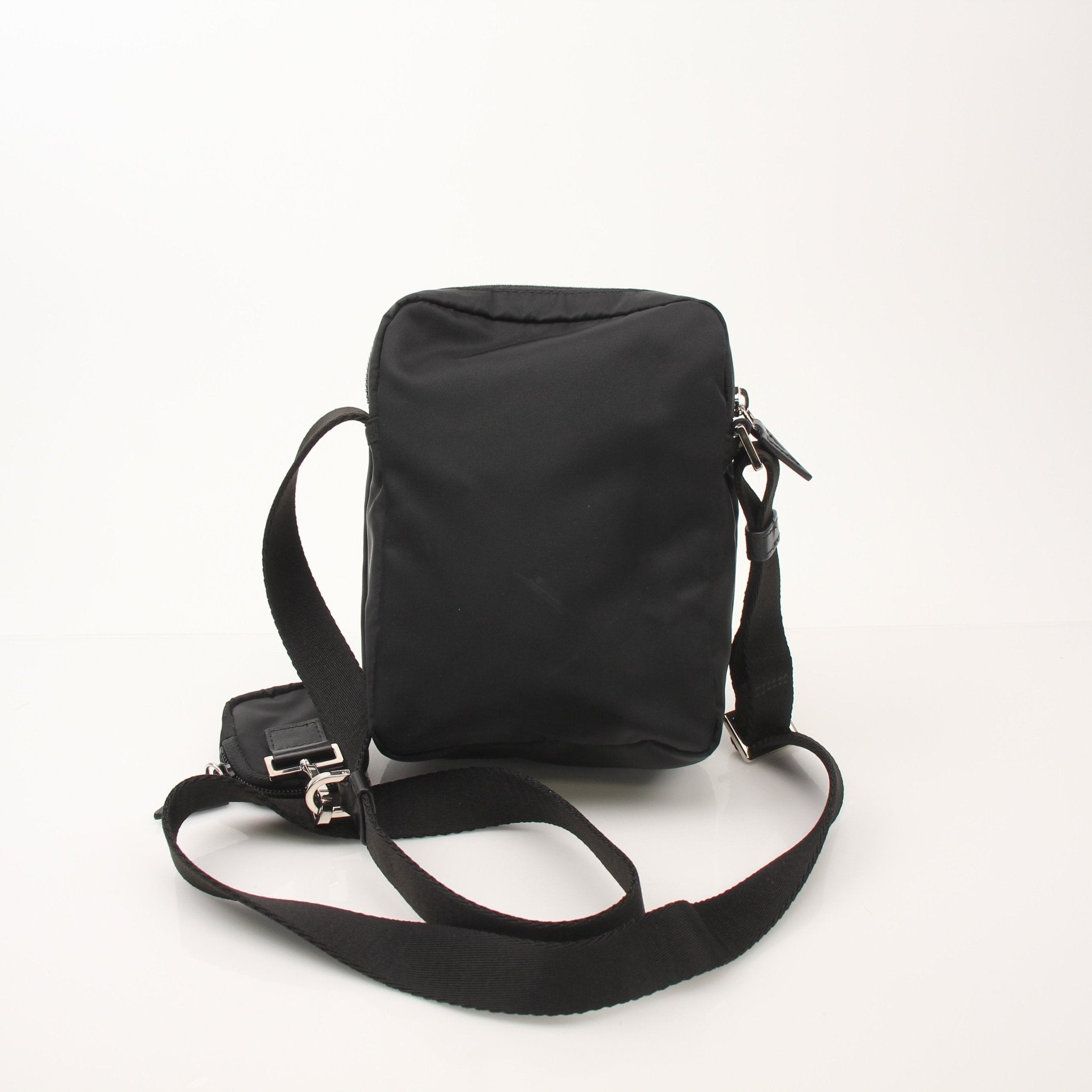 Gold & Beyond Versace men's nylon crossbody handbag with Medusa head design, featuring a sleek black strap and gold accents.