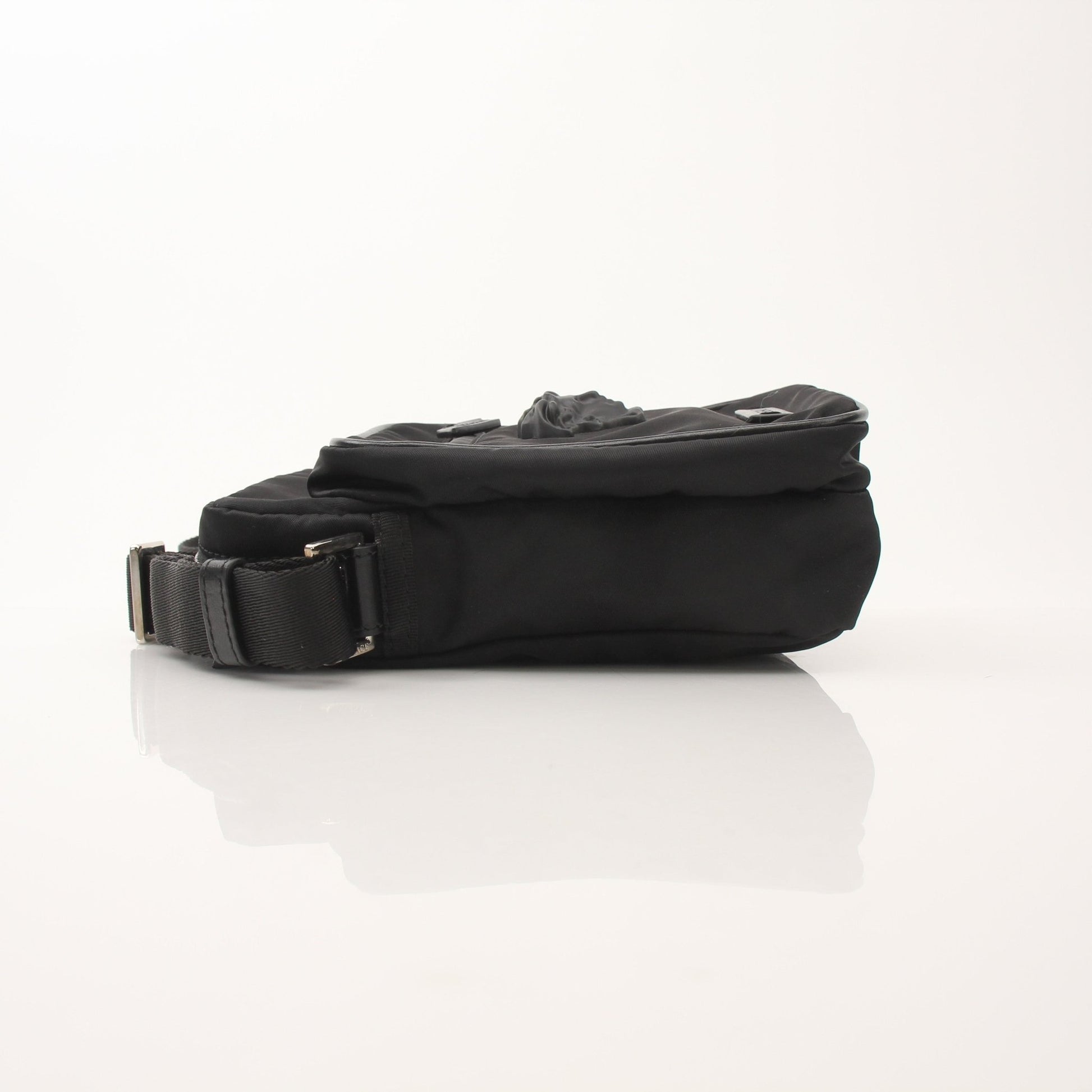 Gold & Beyond Versace men's nylon crossbody handbag with Medusa head logo, featuring a sleek design and adjustable strap.