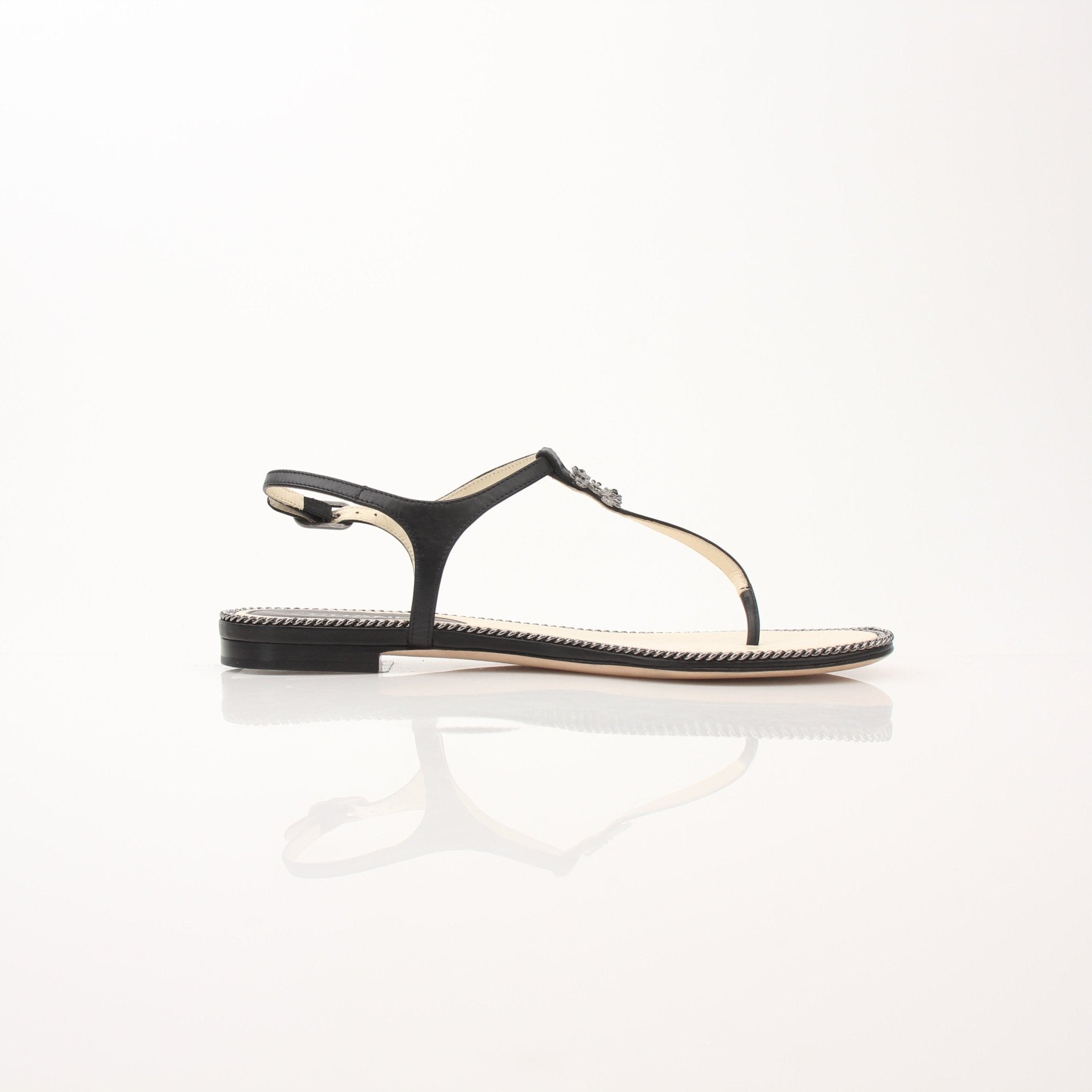 Gold & Beyond Chanel women’s chain trim thong sandals with sleek straps and stylish design, perfect for casual summer wear.