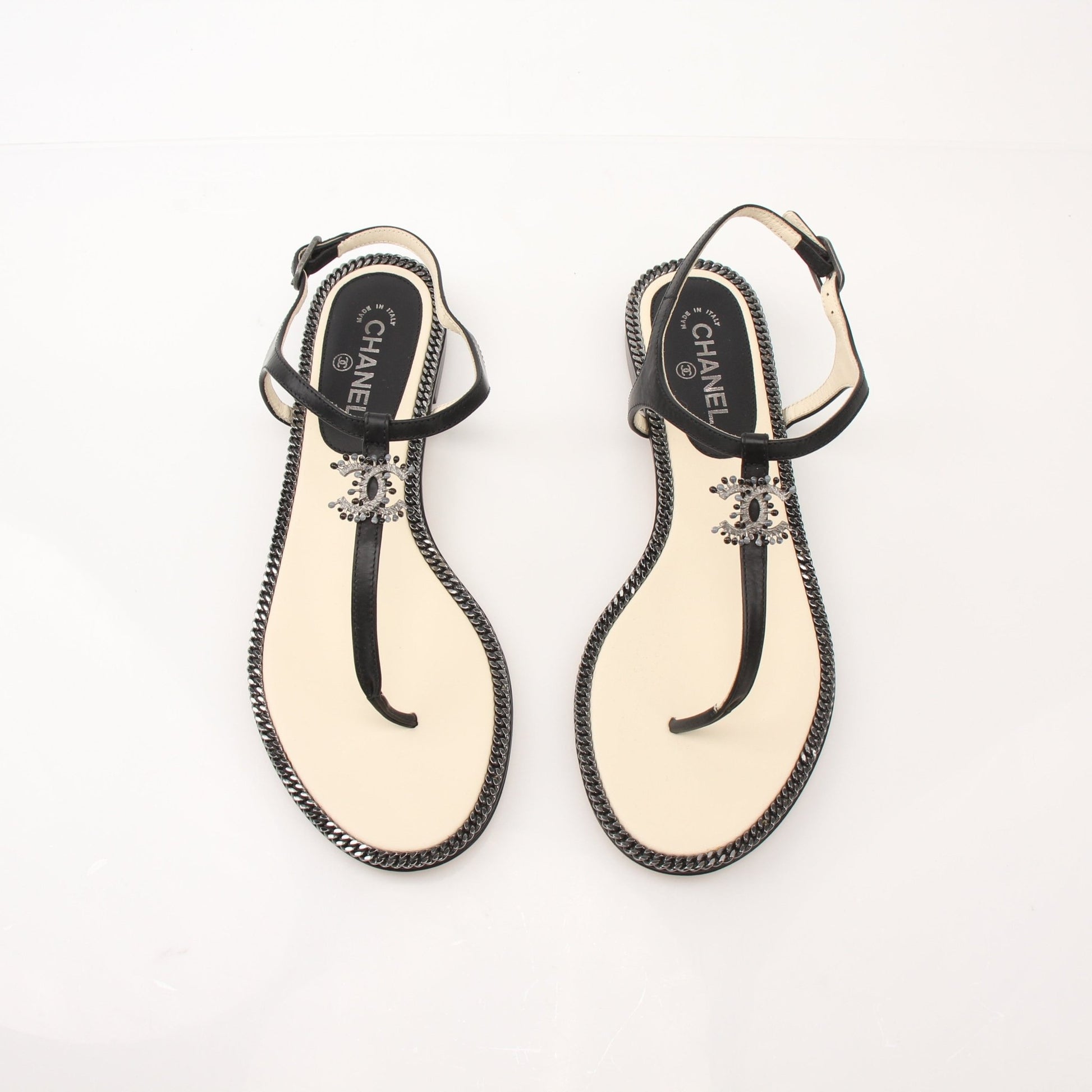 Gold & Beyond Chanel Women's Chain Trim Thong Sandals, stylish leather shoes with metallic chain accents on the straps.