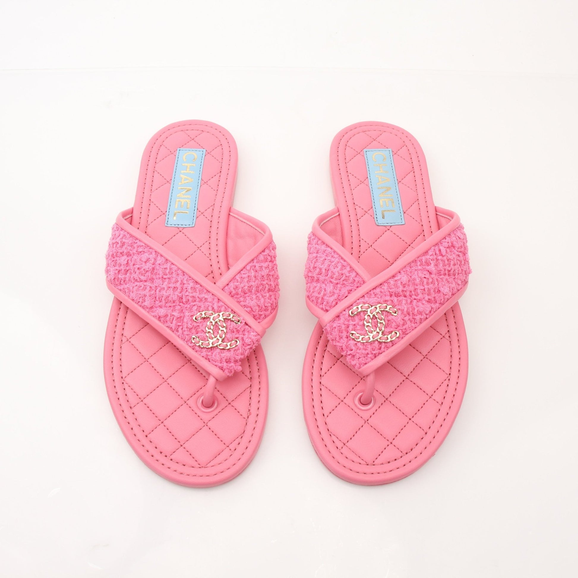 Gold & Beyond women's Chanel CC Tweed thong sandals featuring tweed straps and a comfortable slip-on design.