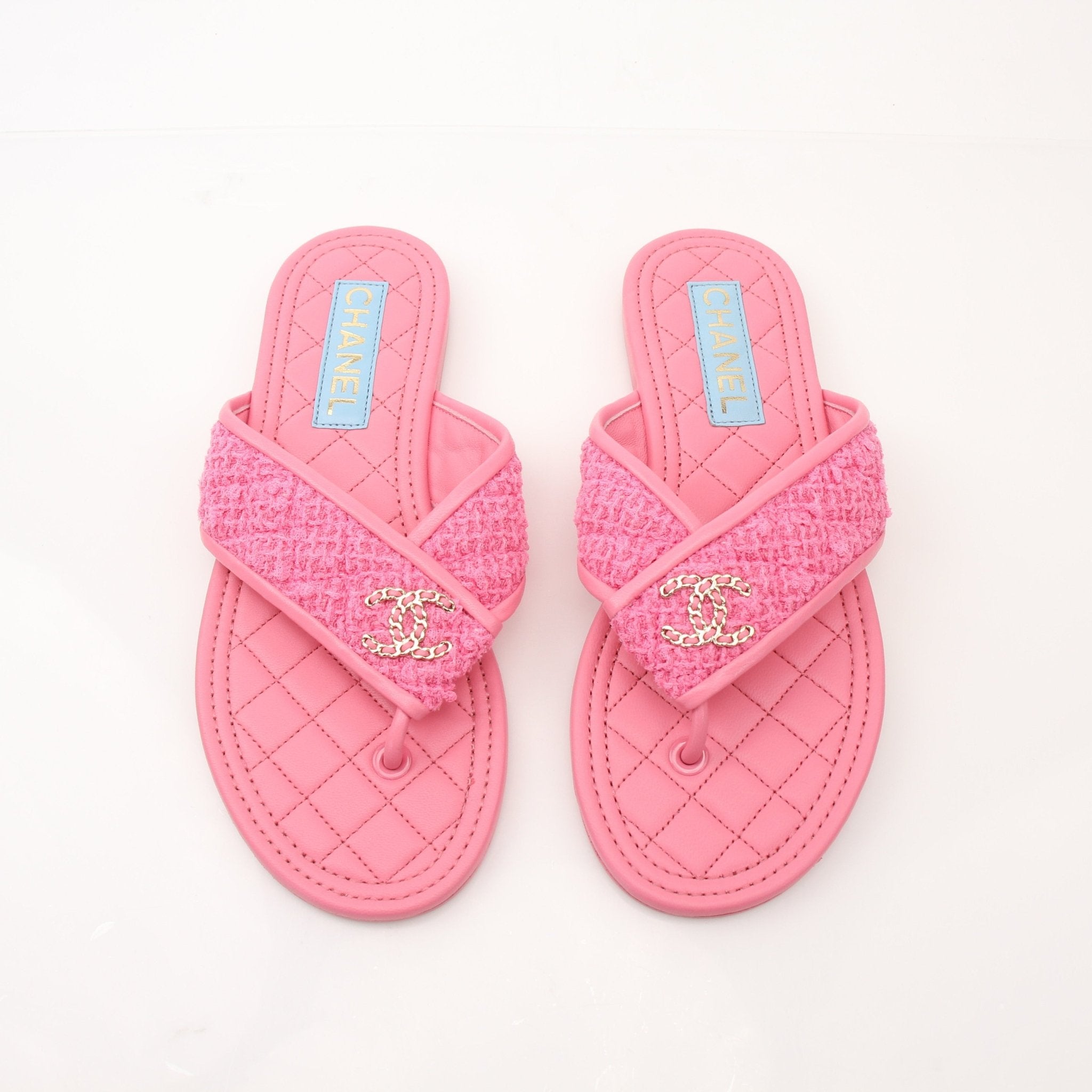 Gold & Beyond women's Chanel CC Tweed thong sandals featuring tweed straps and a comfortable slip-on design.