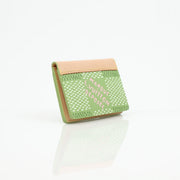 Green Louis Vuitton x Tyler The Creator pocket organizer card holder with multiple card slots and designer details.