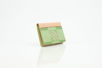 Louis Vuitton x Tyler, The Creator green monogram canvas pocket organizer wallet with sleek design and compact size.
