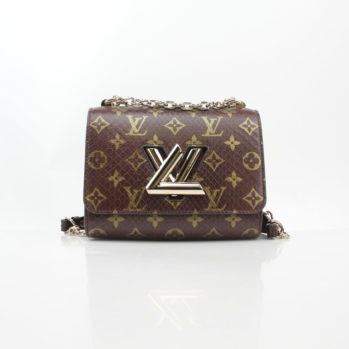 Louis Vuitton Brown Monogram Python Twist PM crossbody handbag with gold accents and adjustable strap, stylish and compact for everyday use.